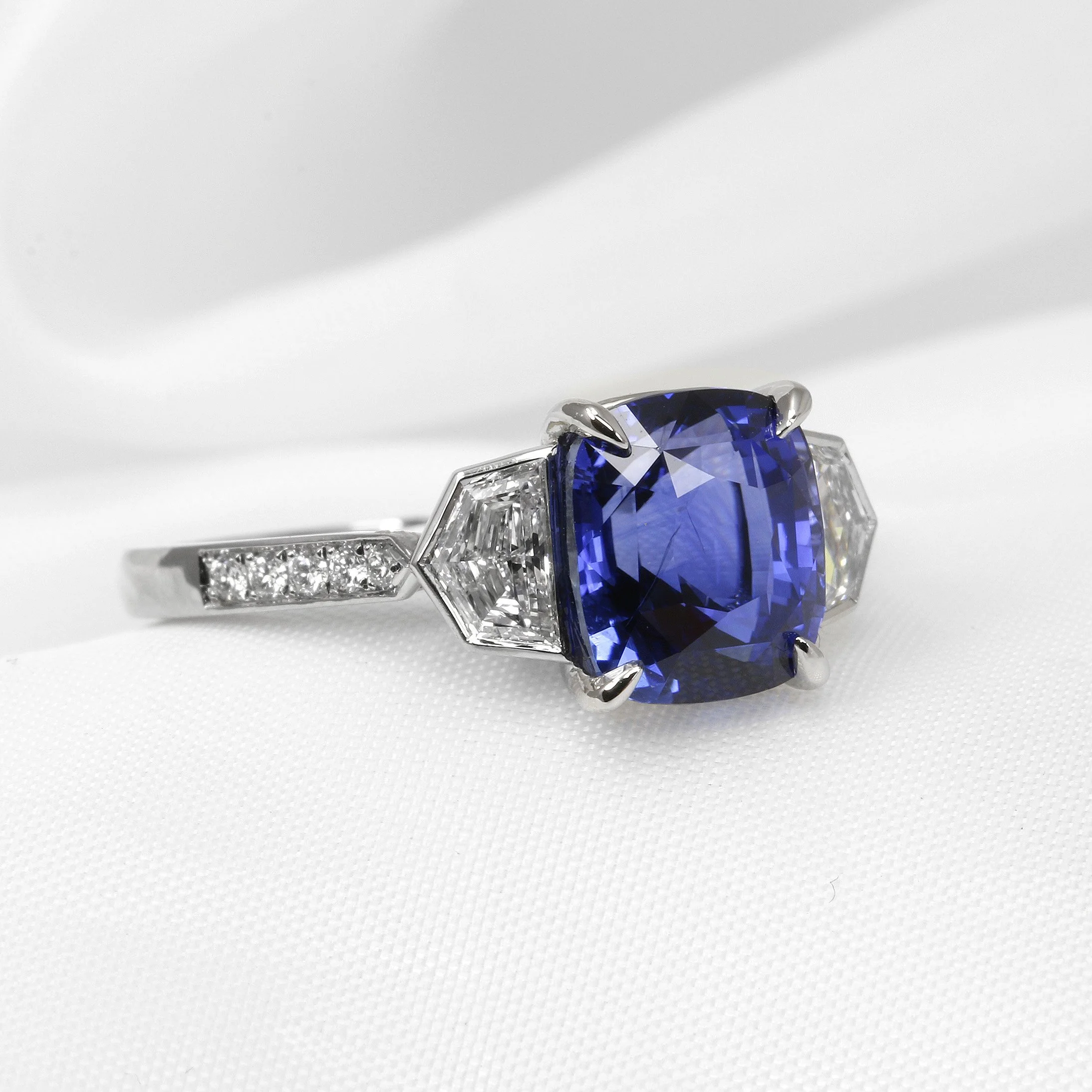 Cushion Sapphire and Cadillac Diamond Ring in Platinum