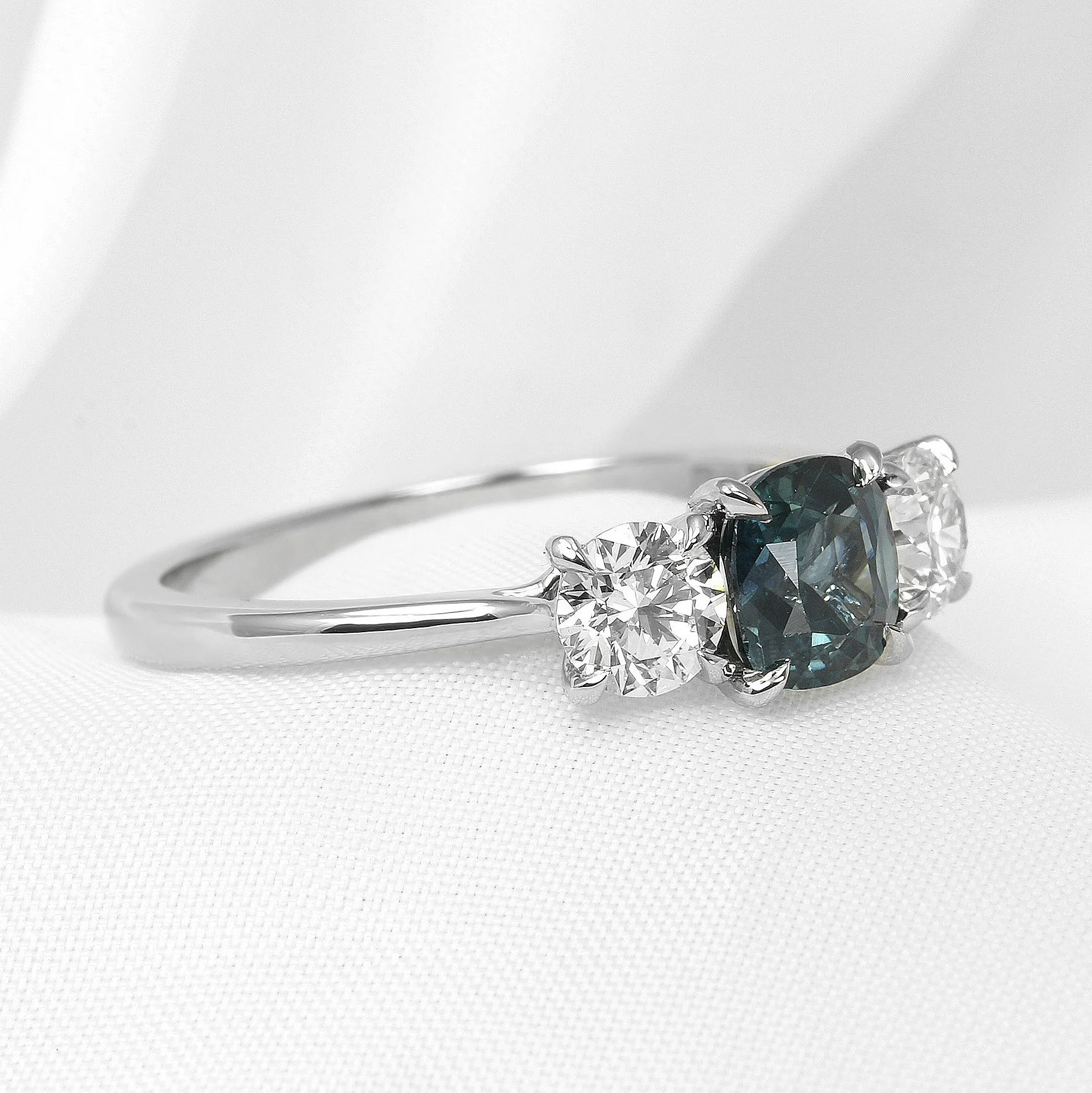 Cushion Teal Sapphire and Diamond Ring in Platinum