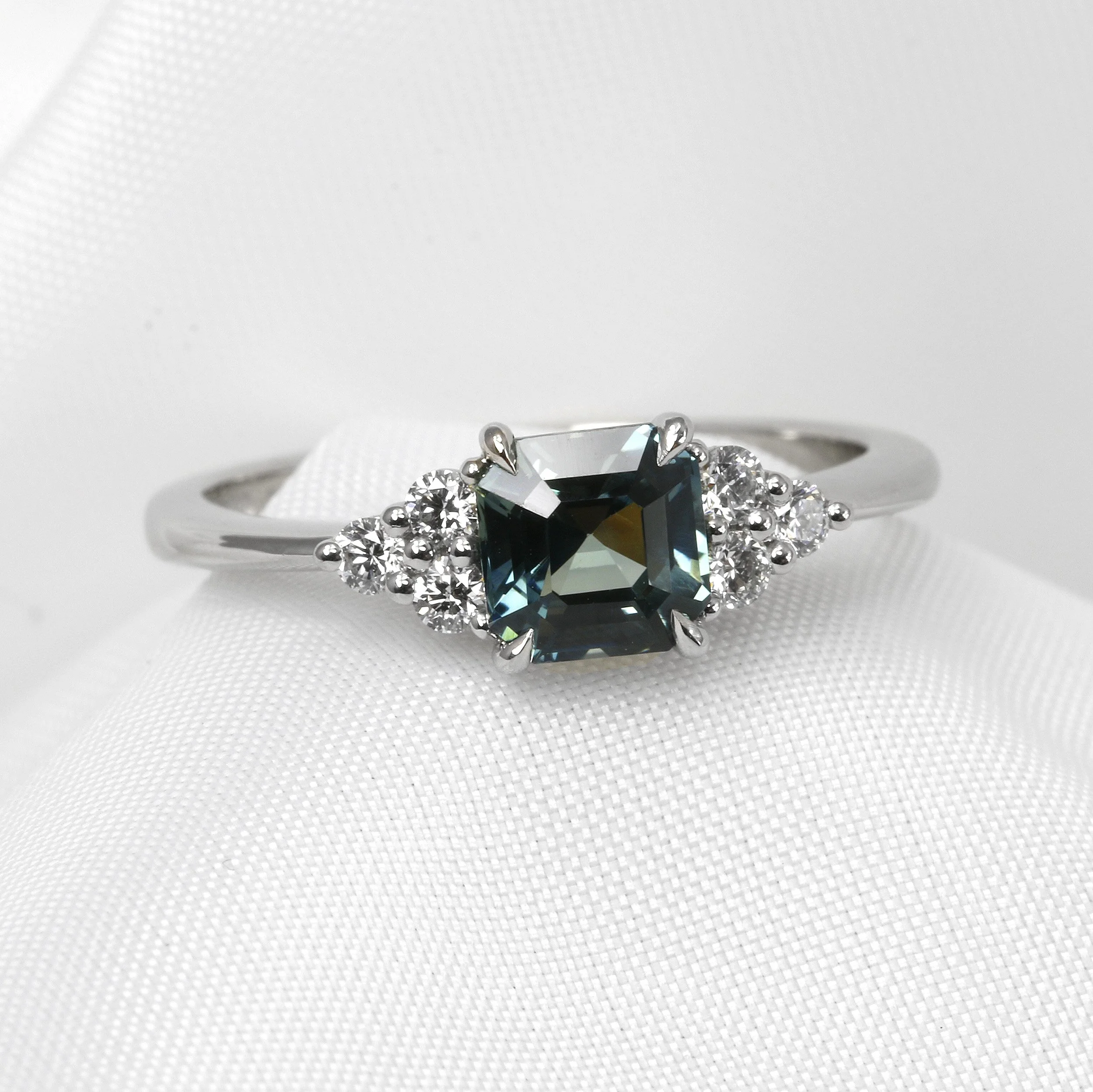 Teal Sapphire Ring with Diamond Trefoil in Platinum