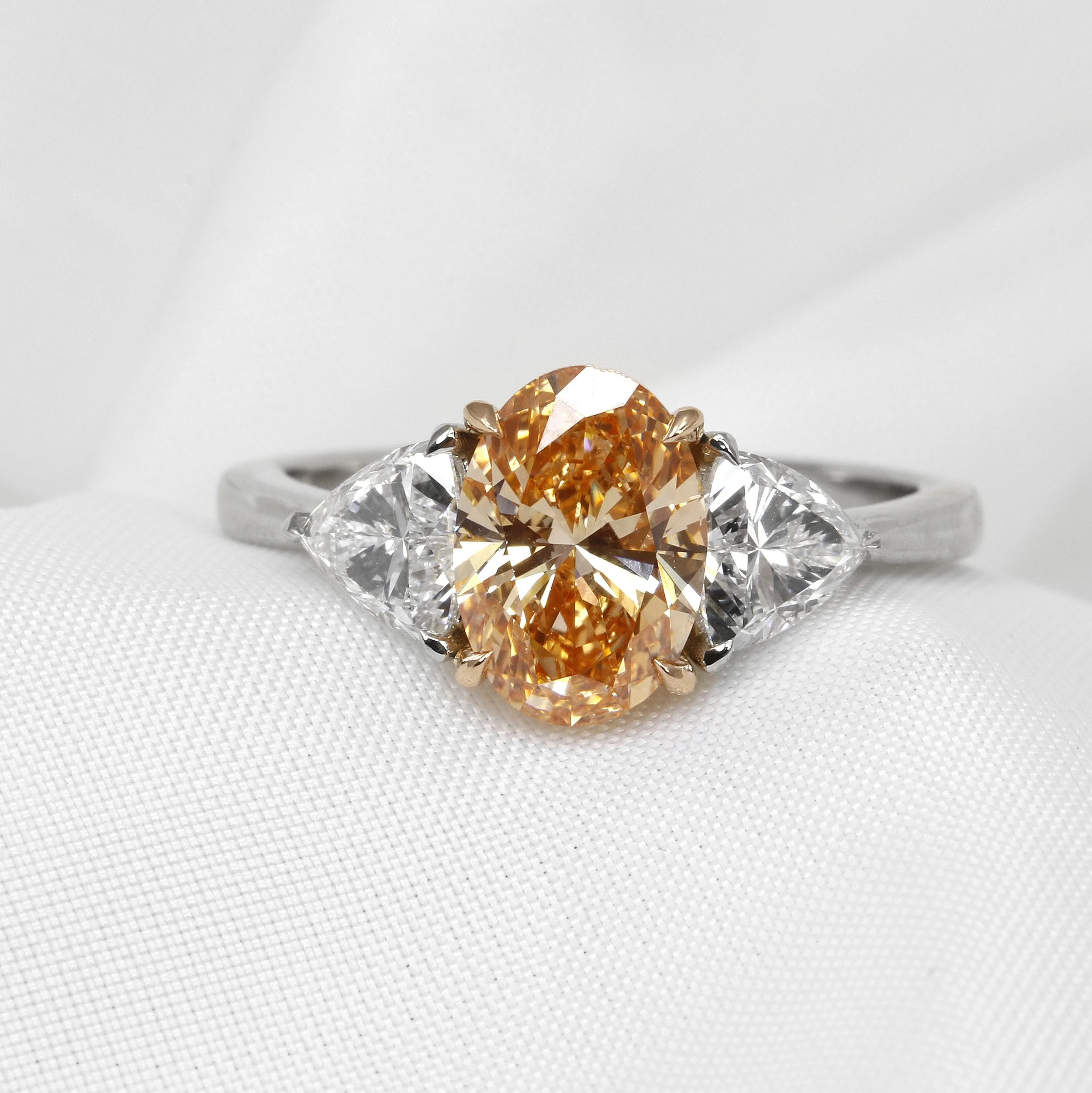 Lab Created Orange Oval and Trilliant Cut Diamond Three Stone Ring