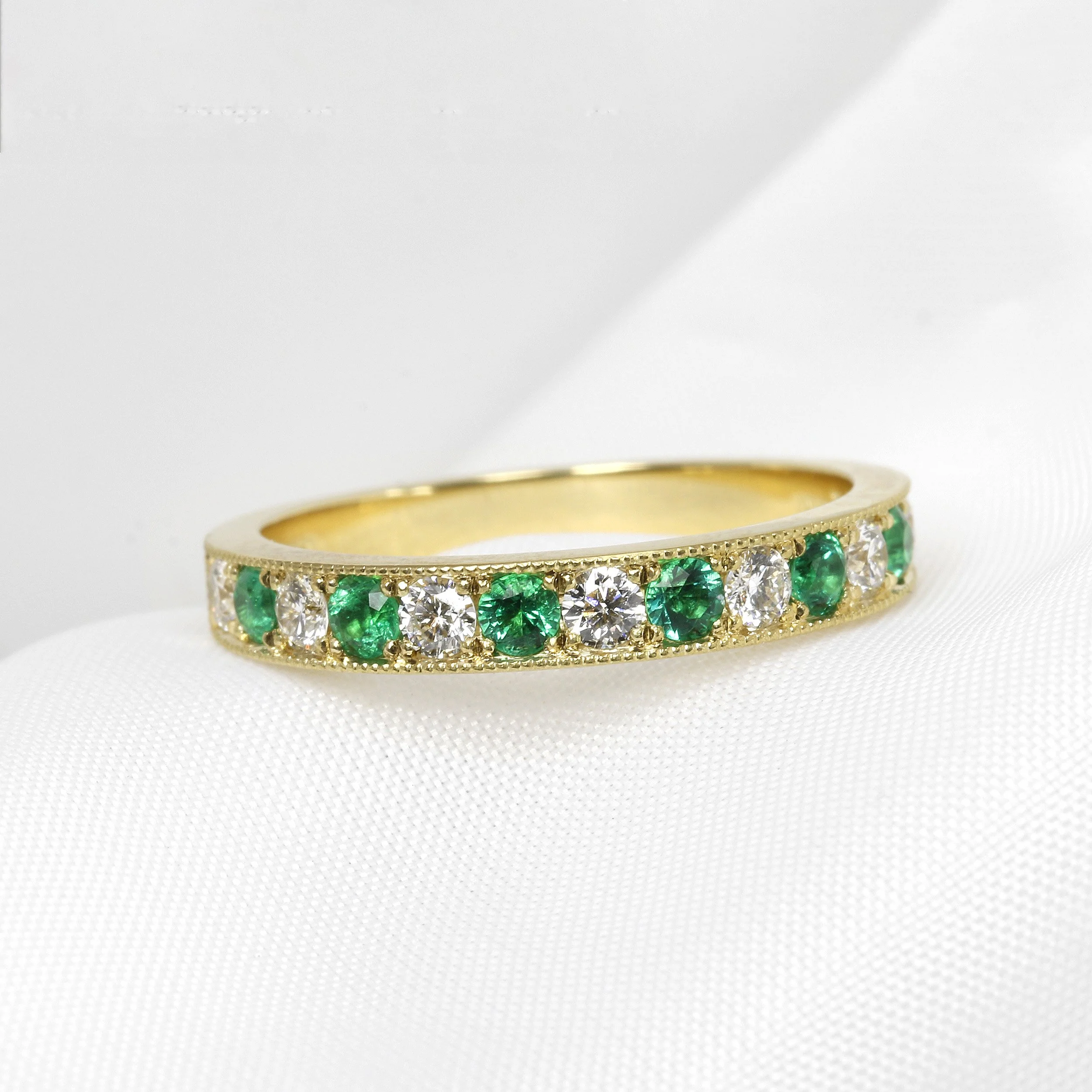 Emerald and Diamond Eternity Ring in Platinum