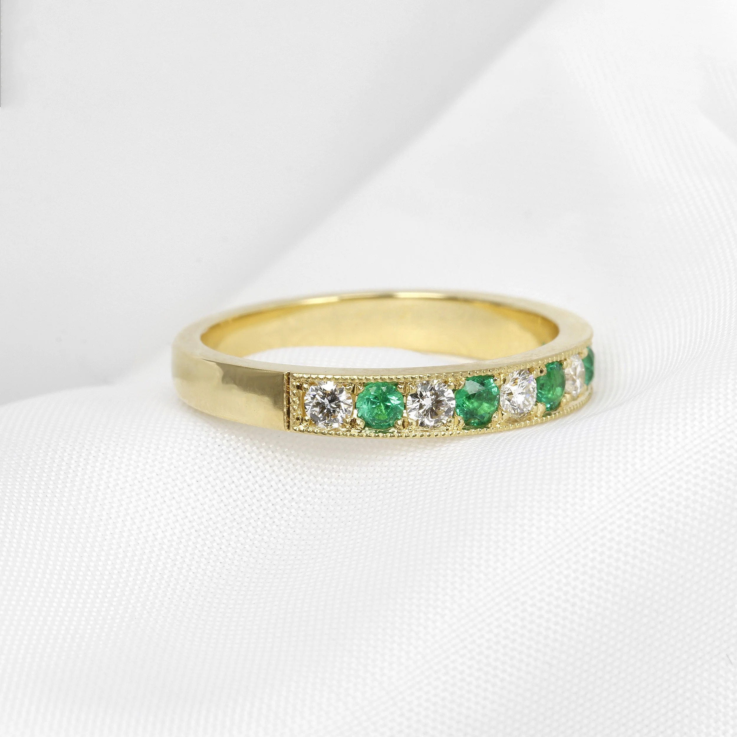 Emerald and Diamond Eternity Ring in Platinum