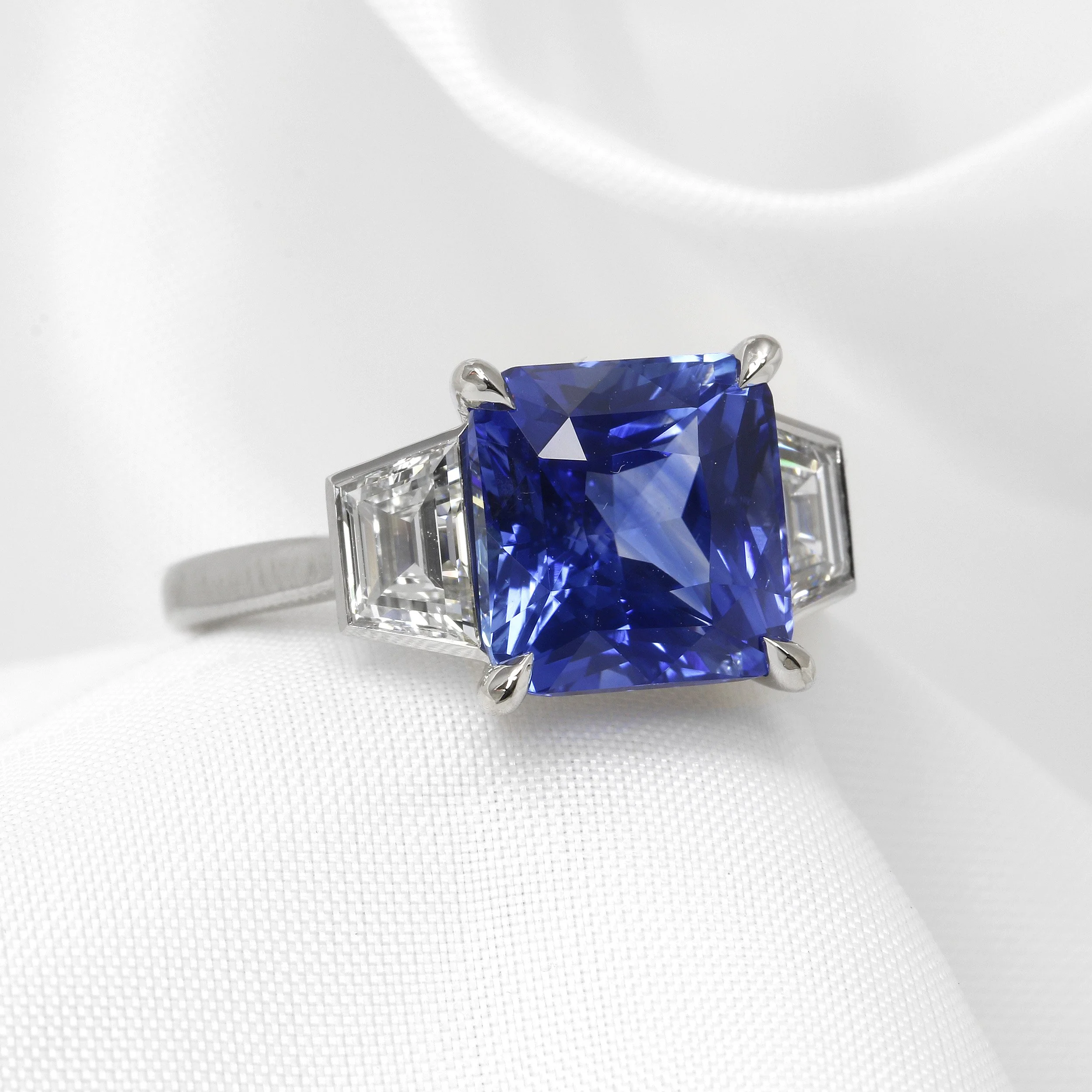 Cushion Sapphire and Trapeze Diamond Three Stone Ring