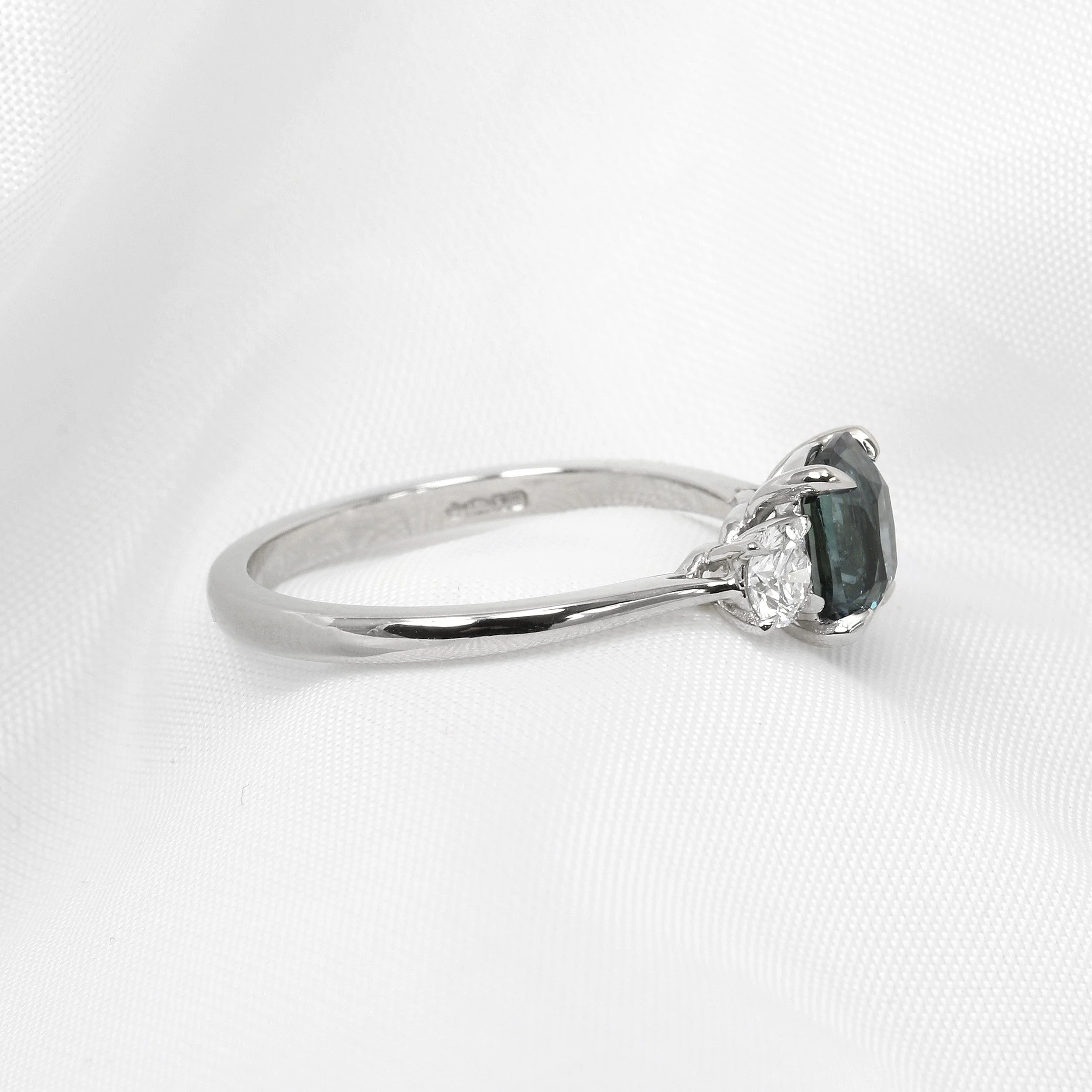 Cushion Teal Sapphire and Diamond Three Stone Ring in Platinum