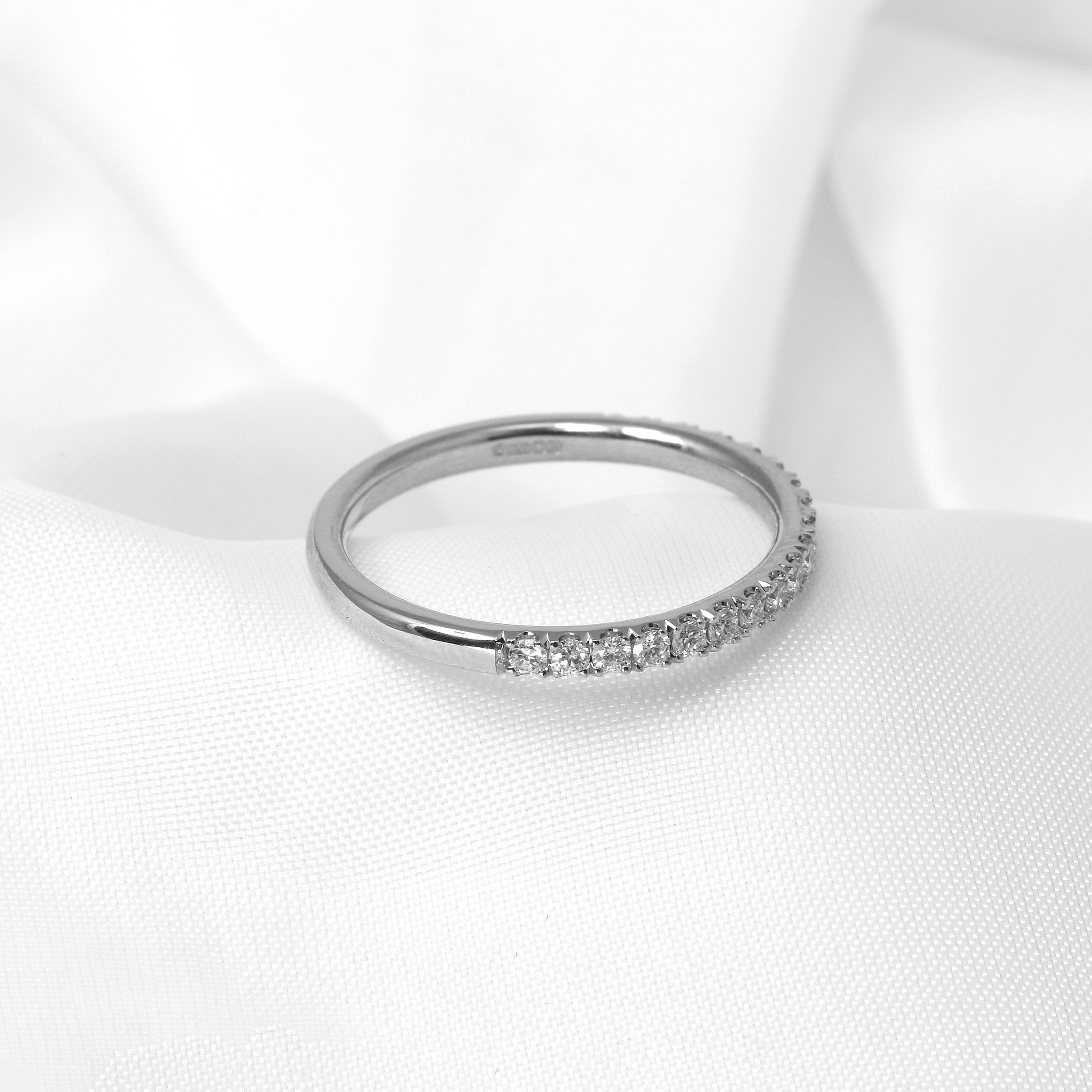 Cutaway Claw Set Diamond Eternity Ring in Platinum