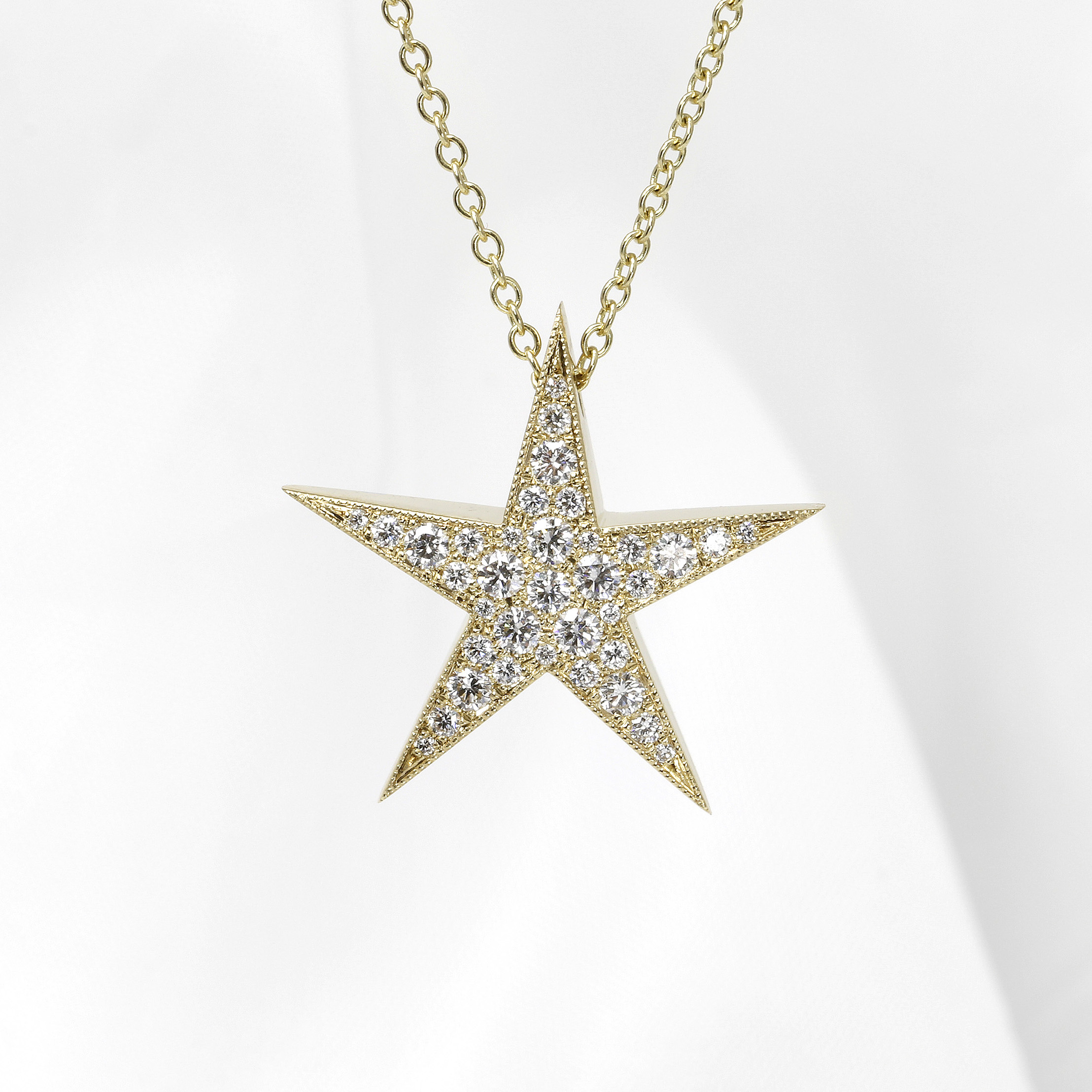 Large Diamond Set Star Pendant in Yellow Gold