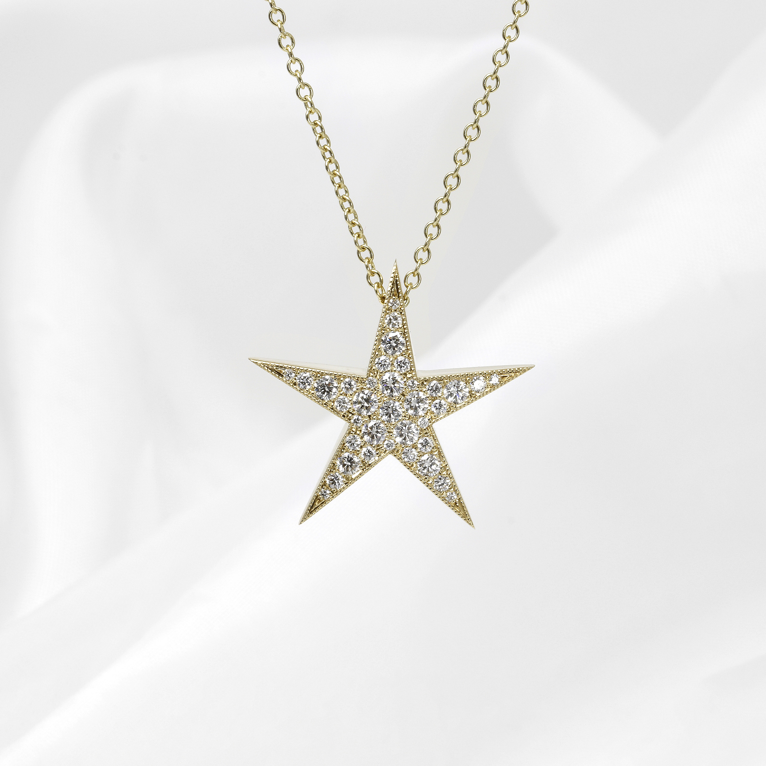 Large Diamond Set Star Pendant in Yellow Gold