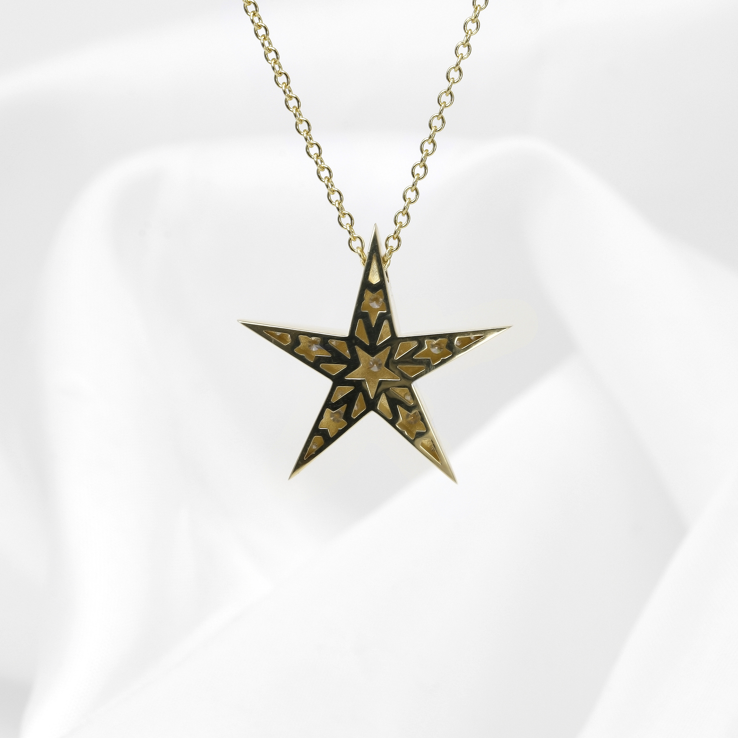 Large Diamond Set Star Pendant in Yellow Gold