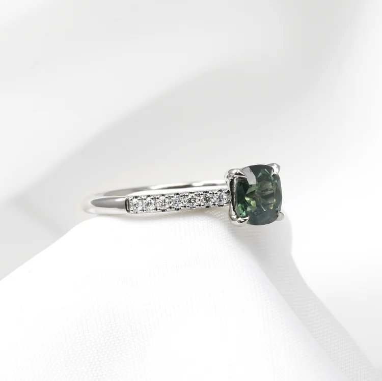 Emerald and diamond engagement ring
