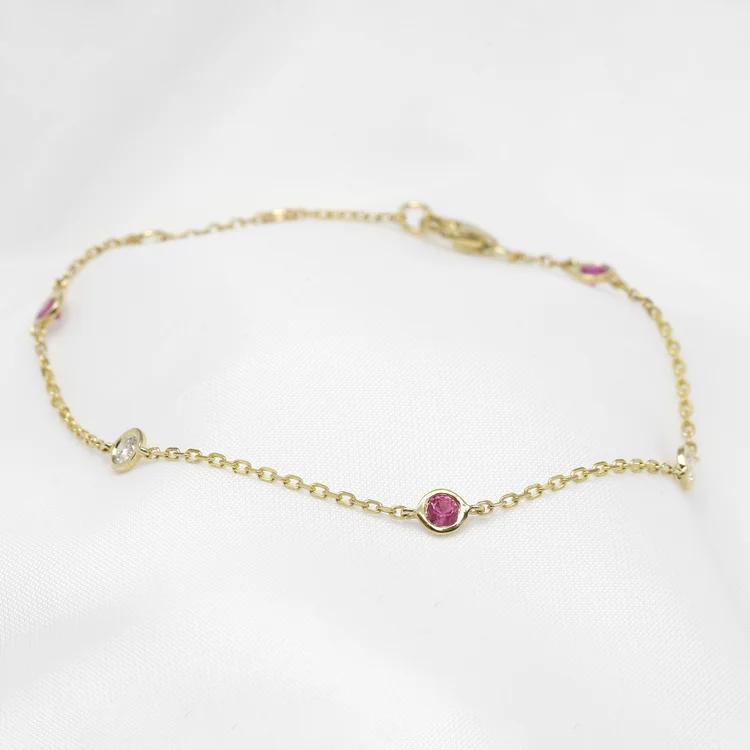 Pink Sapphire and Diamond Station Bracelet in 9ct Yellow Gold