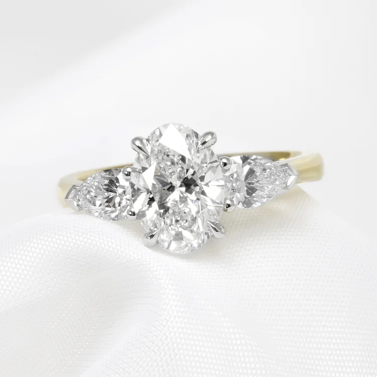 oval diamond pear engagement ring