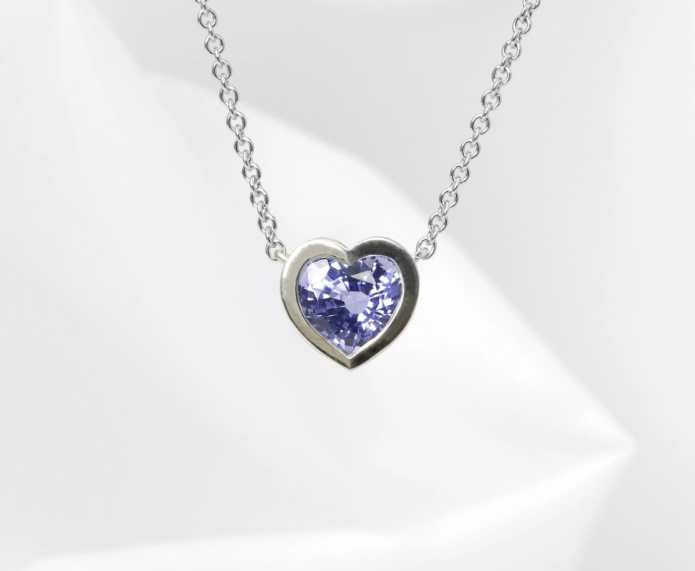 Sapphire Heart Shaped Pendant in White Gold