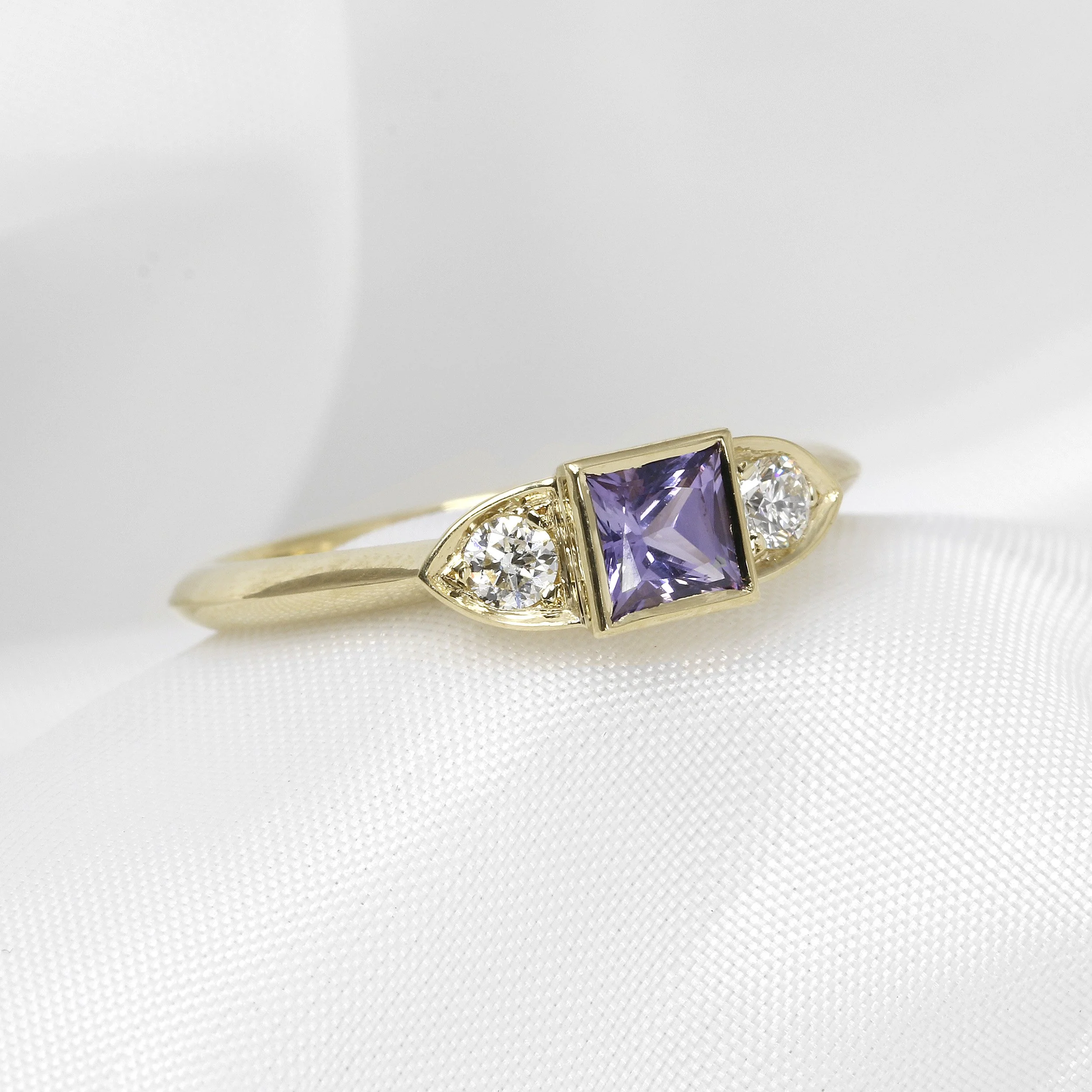 Purple Sapphire and Diamond Three Stone Ring in 9ct Yellow Gold