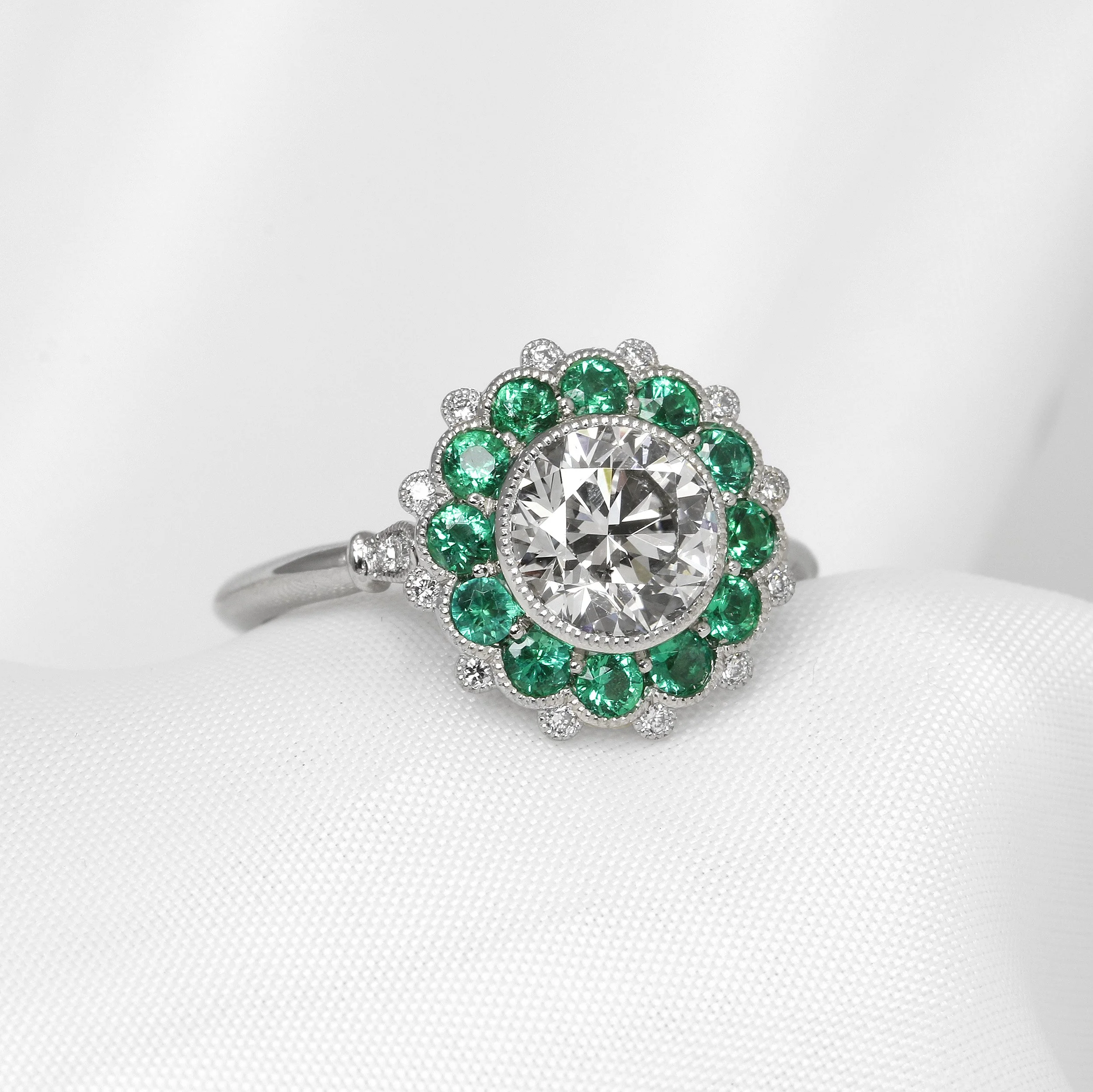 Emerald and Diamond Cluster Ring in Platinum