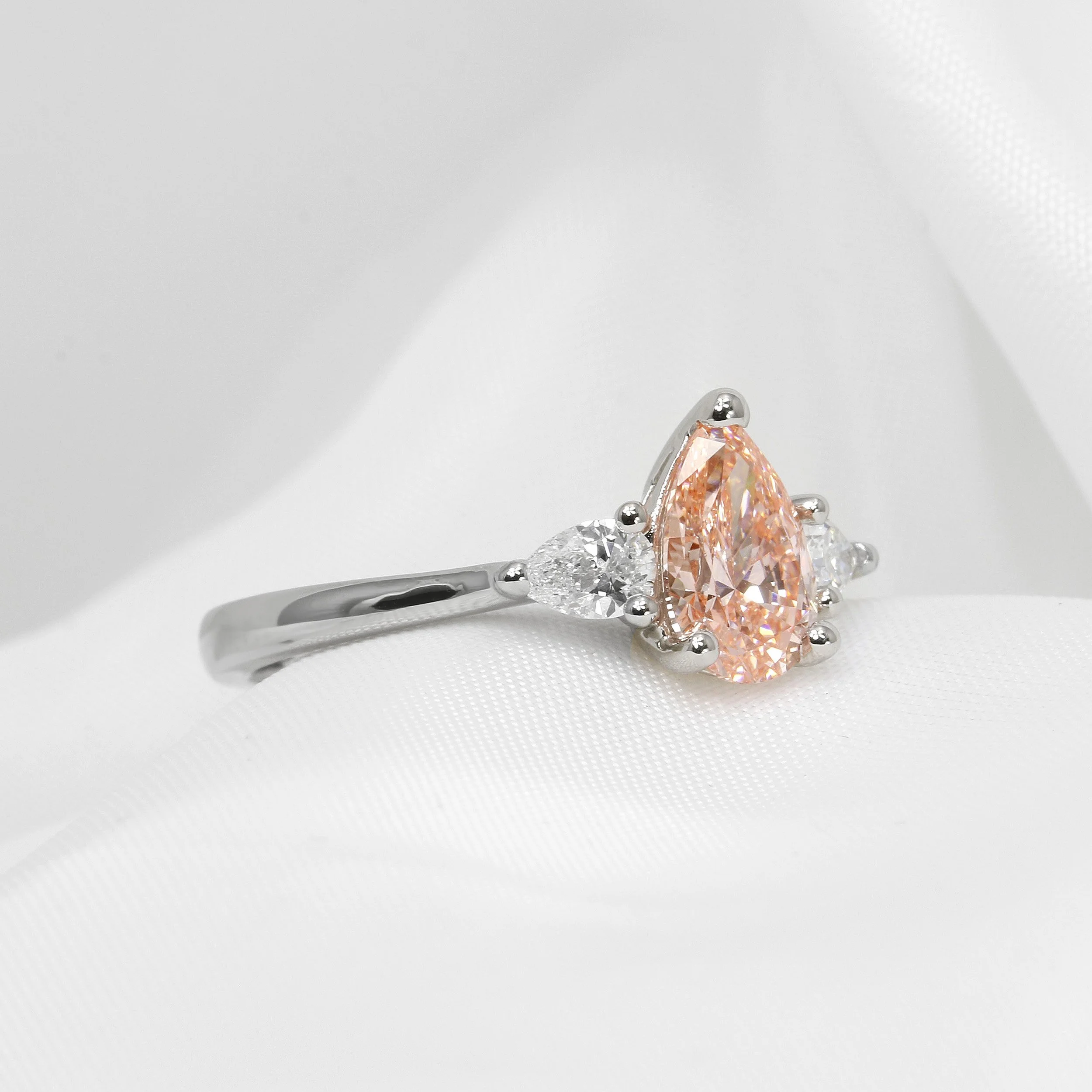 Laboratory Created Pink Pear Shape Diamond Three Stone Ring