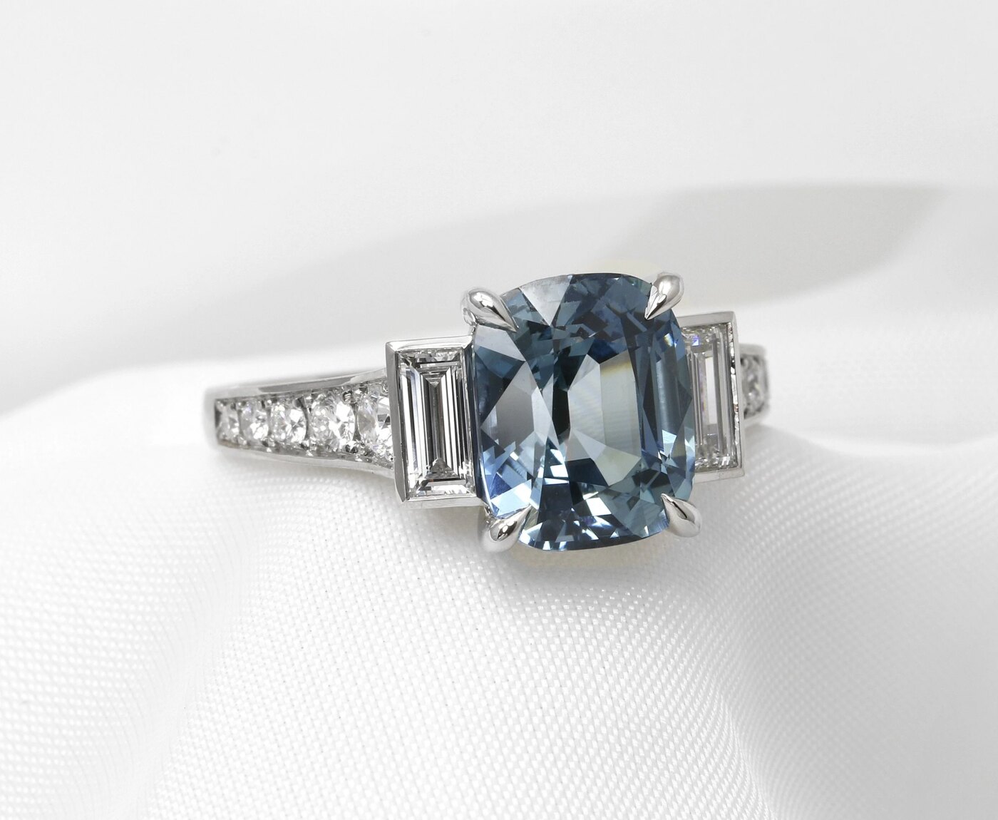 Steel blue sapphire and diamond ring in platinum