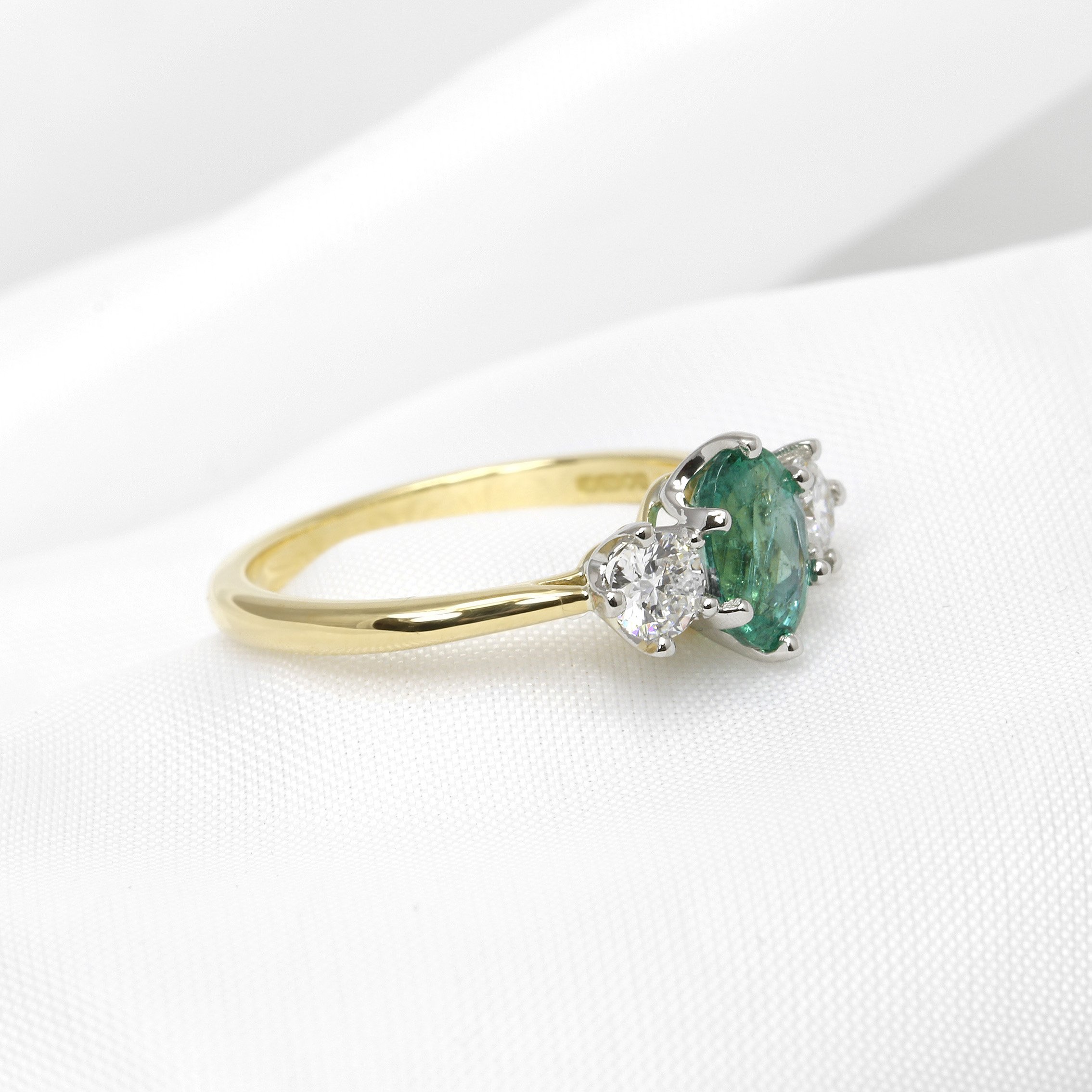 Oval Emerald and Diamond Three Stone Ring in Yellow Gold and Platinum