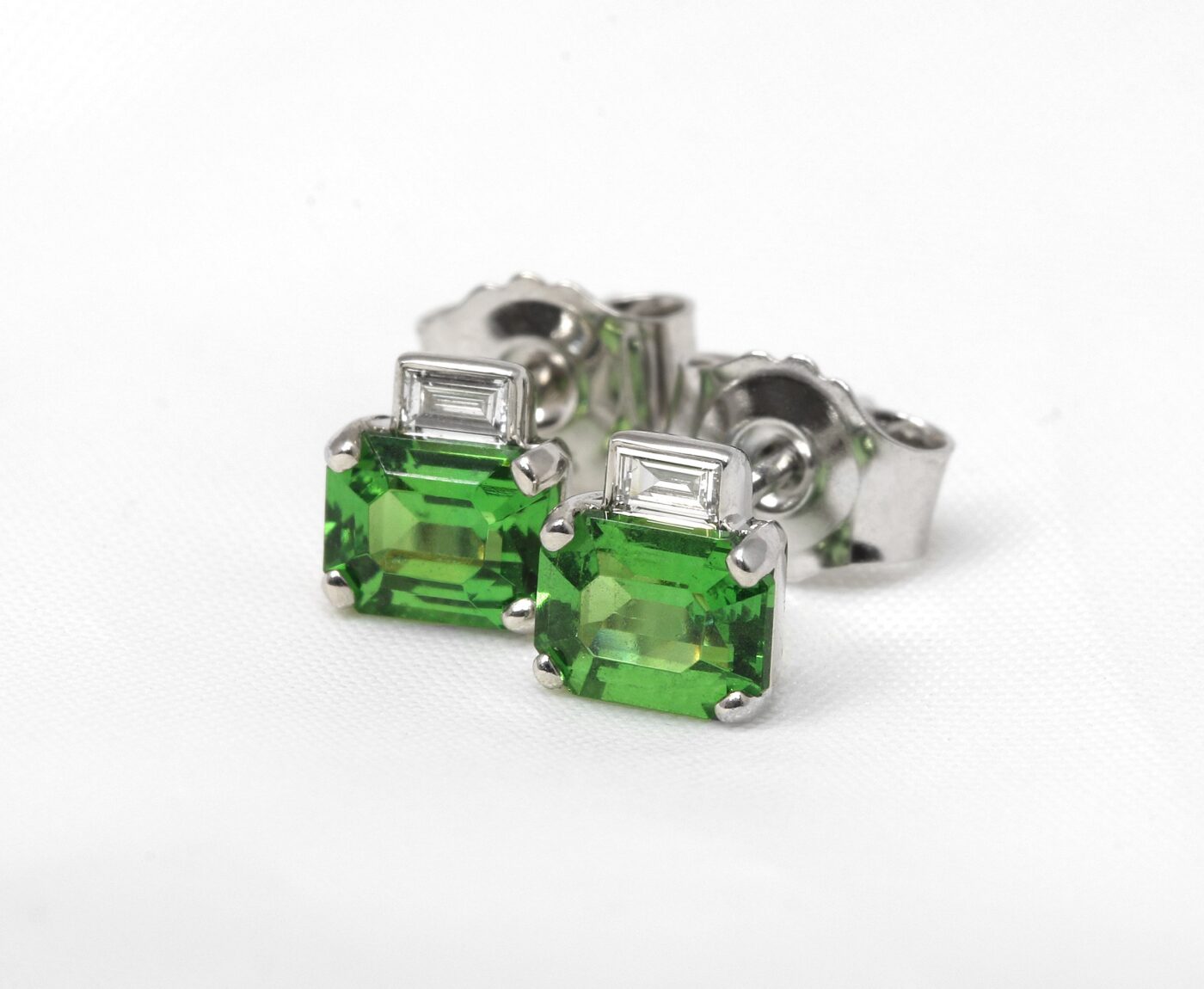 Grossular Garnet: Timothy Roe Tsavorite Garnet and Baguette Diamond Stud Earrings in White Gold 