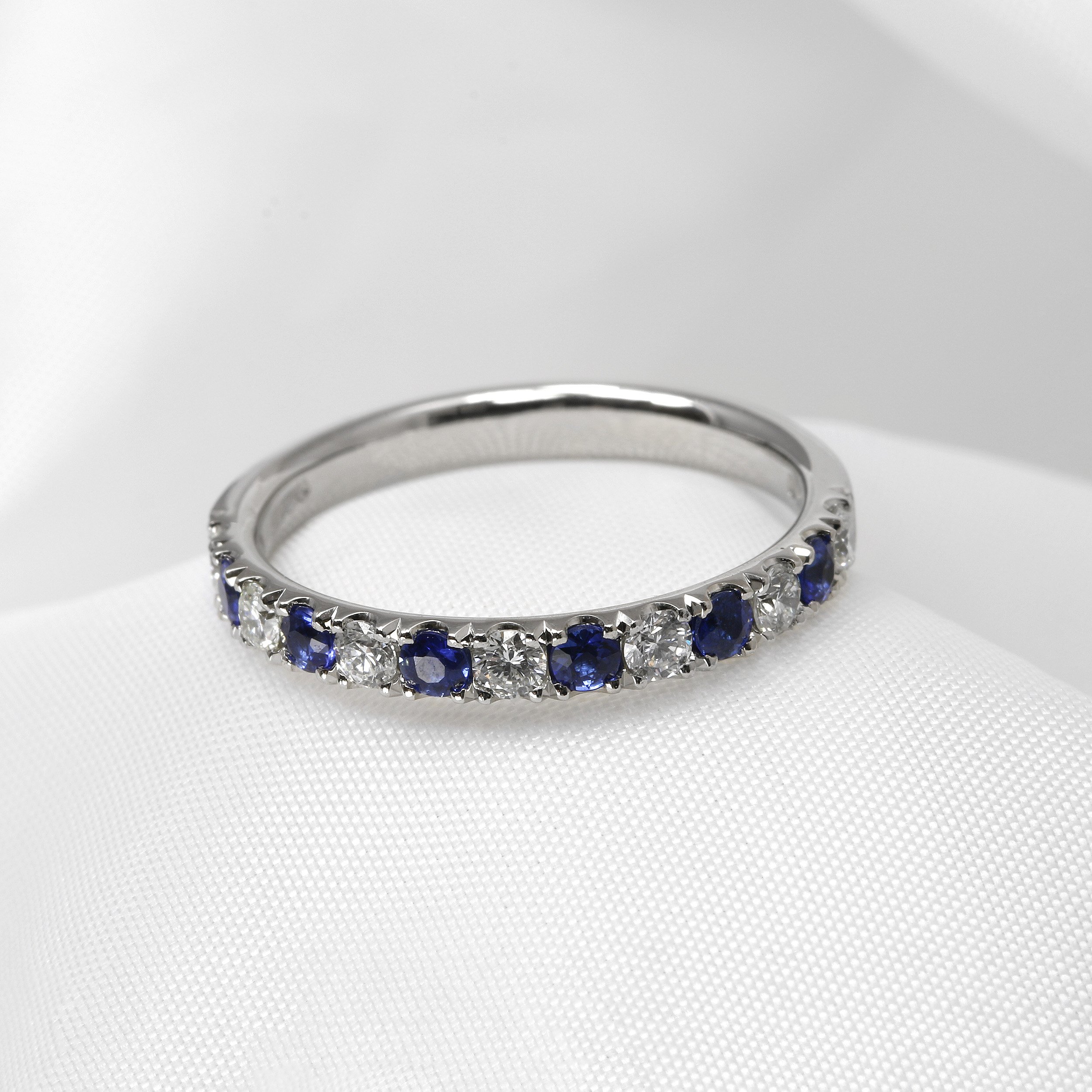 Sapphire and Diamond Half Eternity Ring in Platinum