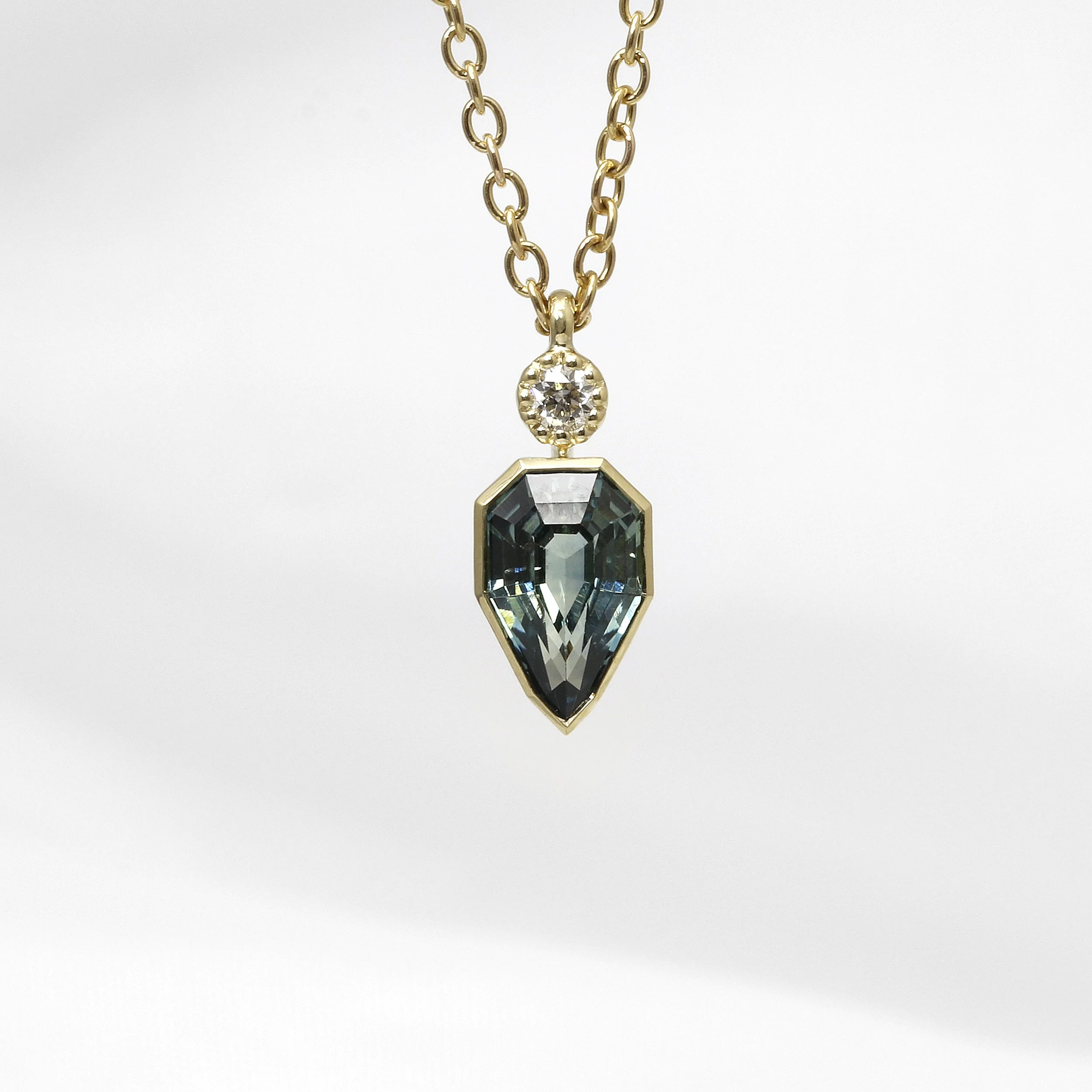 Teal Sapphire & Diamond Pendant in 9ct Yellow Gold