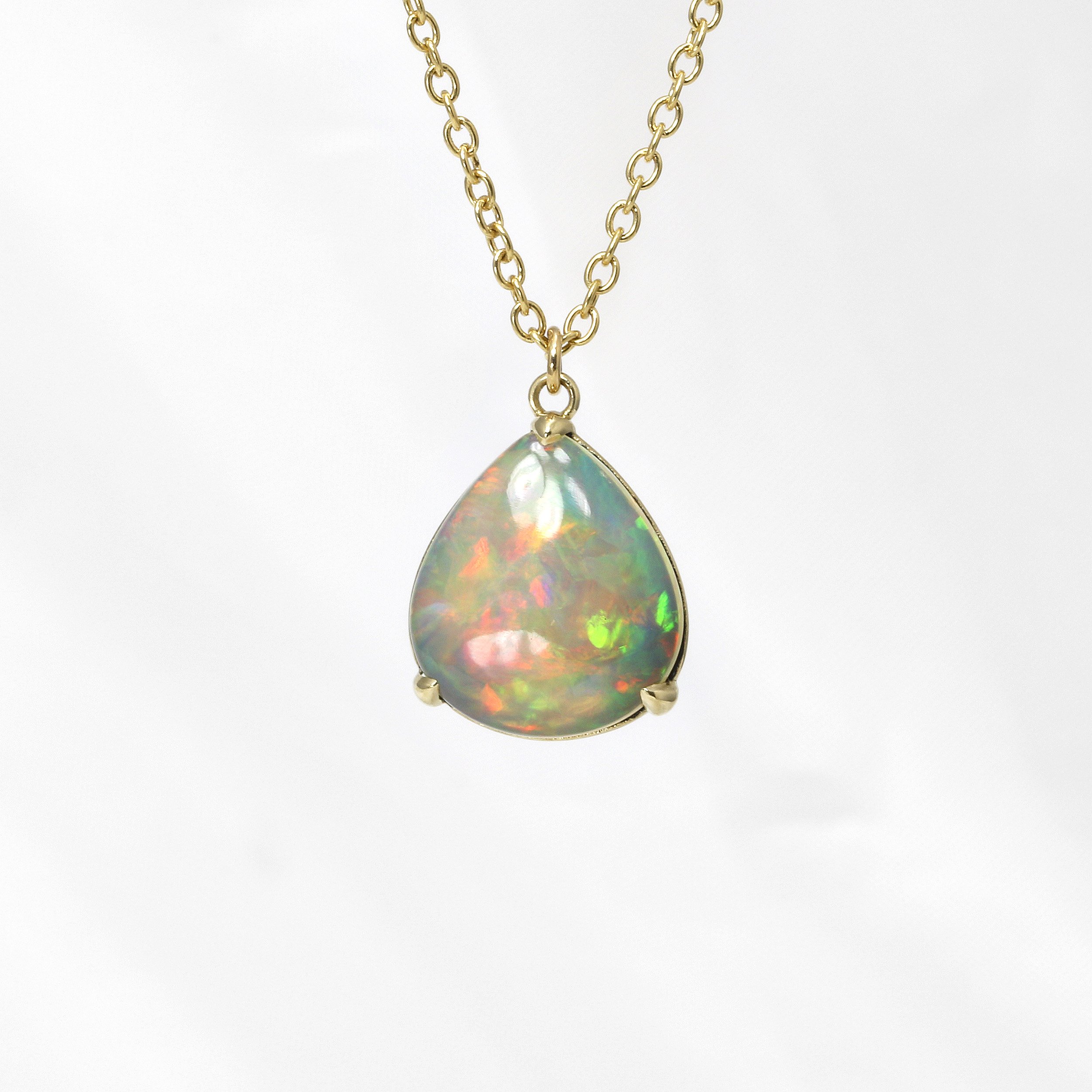Pear Shape Opal Pendant in Yellow Gold