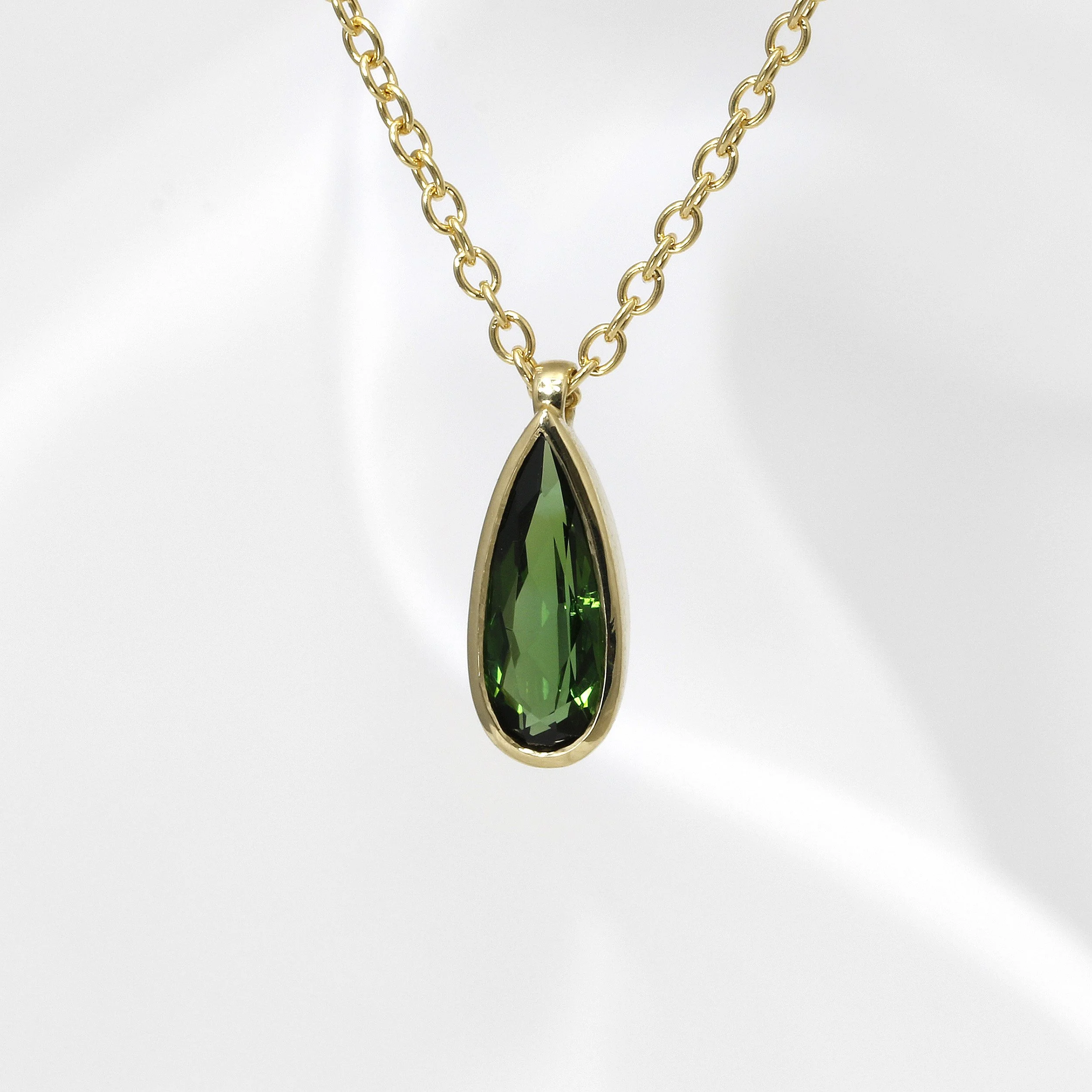 Green Tourmaline Drop Pendant in Yellow Gold
