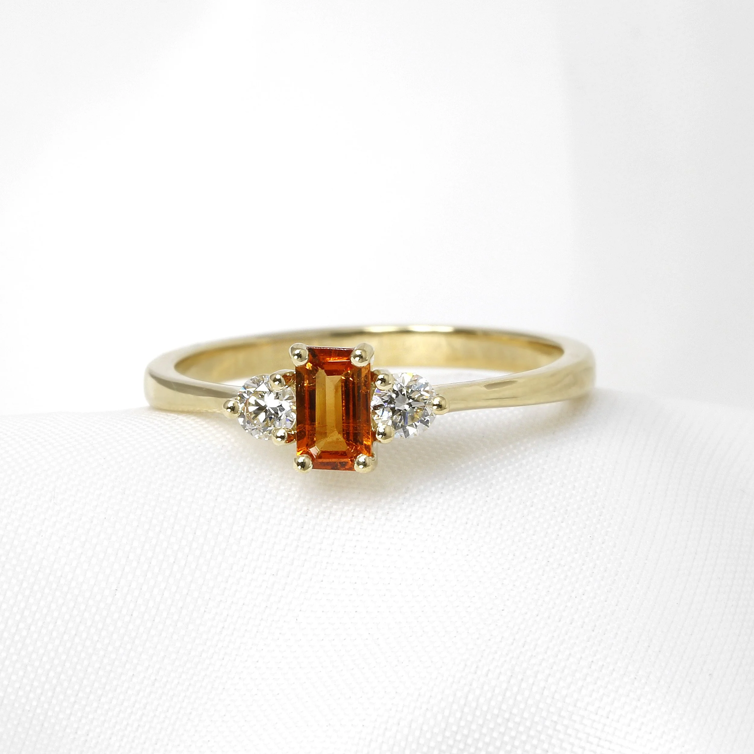 Mandarin Garnet and Diamond Three Stone Ring in Yellow Gold