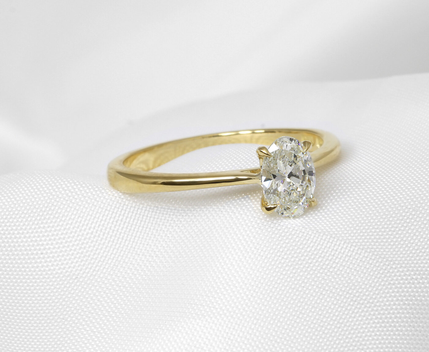 Oval Diamond Solitaire Ring in 18ct yellow gold