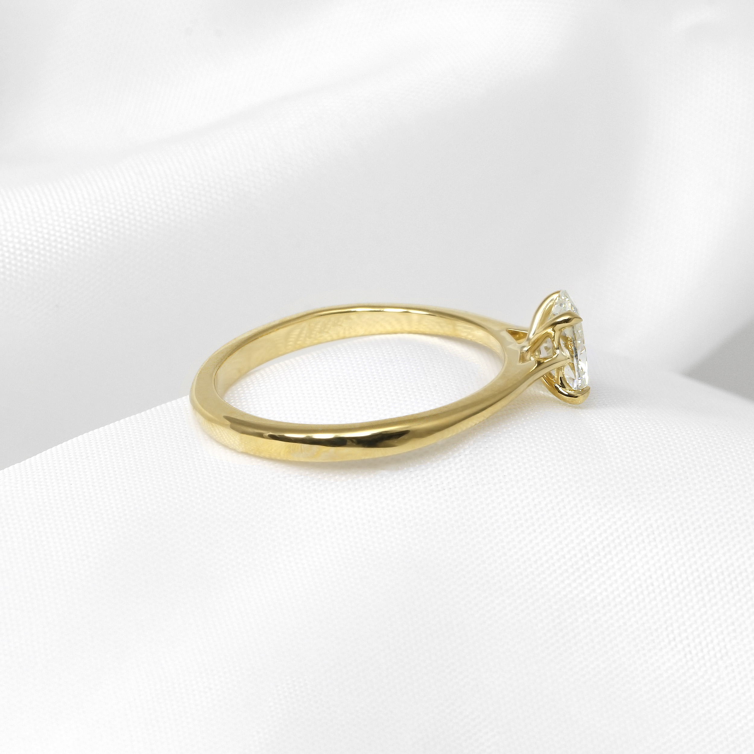Oval Diamond Solitaire Ring in 18ct yellow gold
