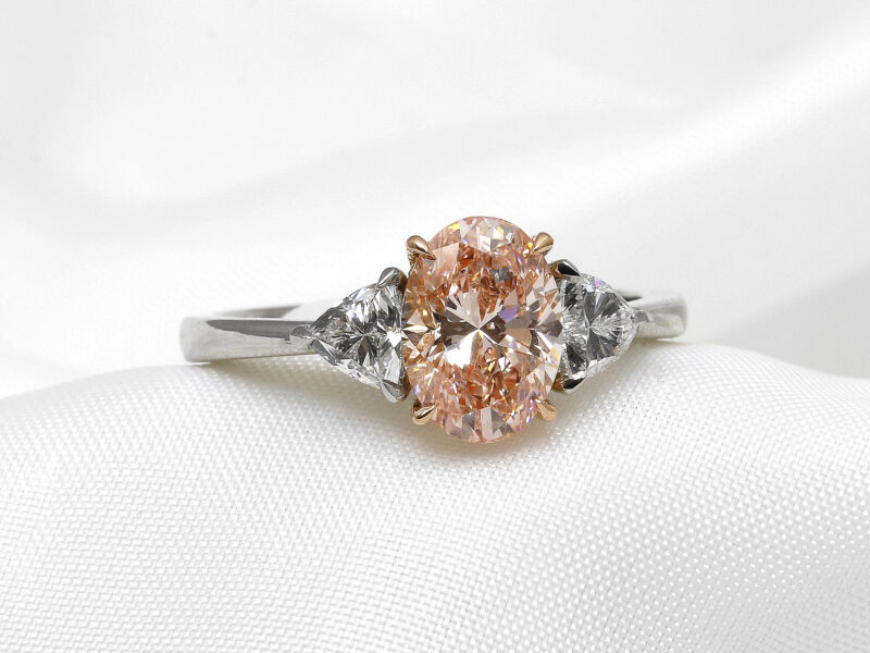 Laboratory Created Pink Oval and Trilliant Cut Diamond Three Stone Ring