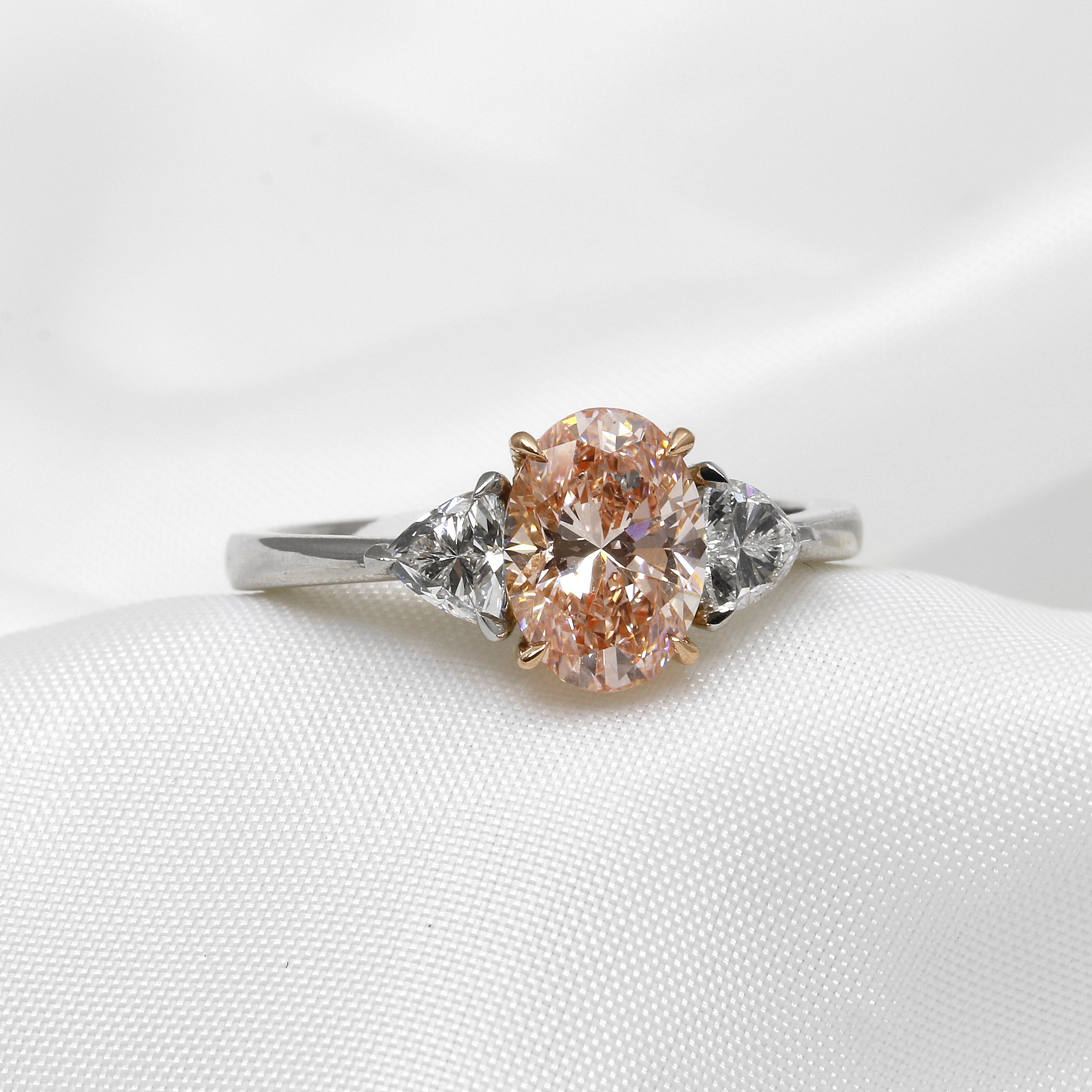 Laboratory Created Pink Oval and Trilliant Cut Diamond Three Stone Ring
