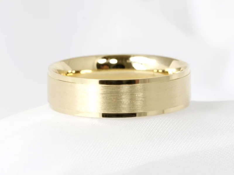 Men's yellow gold wedding band with satin finish