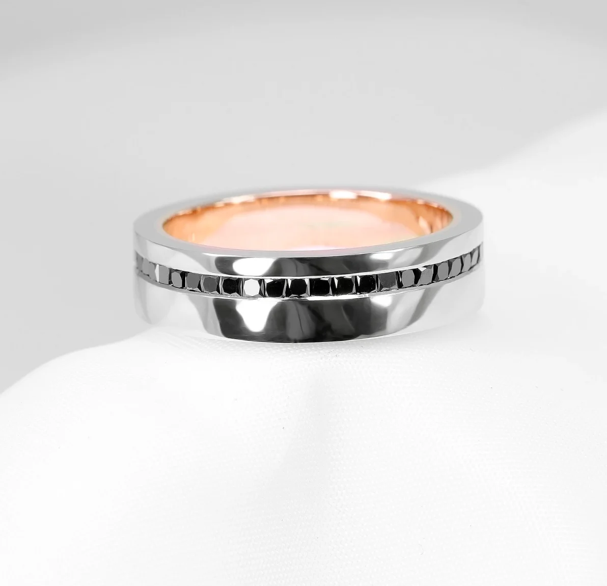 Rose gold, platinum and black diamond wedding band