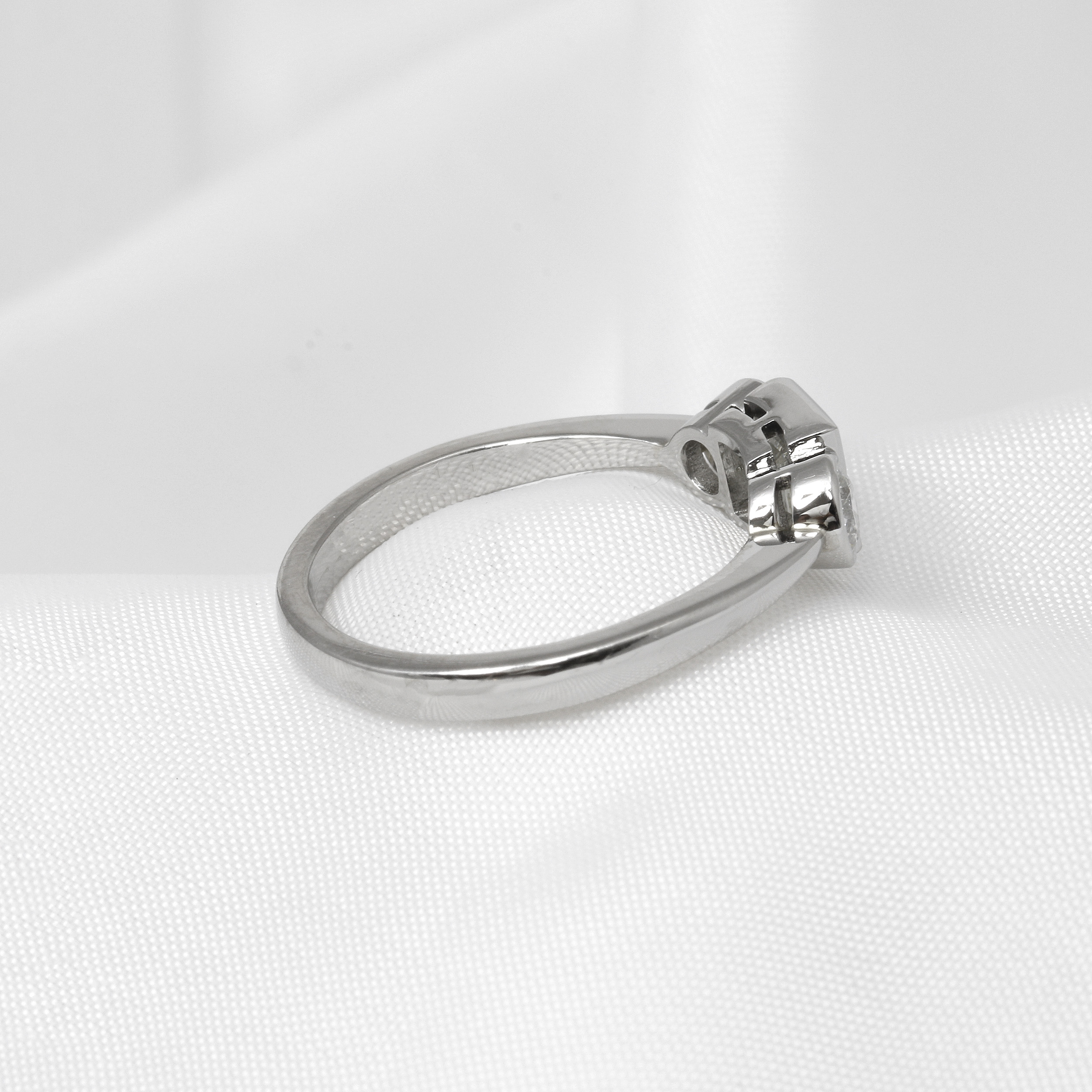 Carré-Cut Three Stone Diamond Ring in Platinum