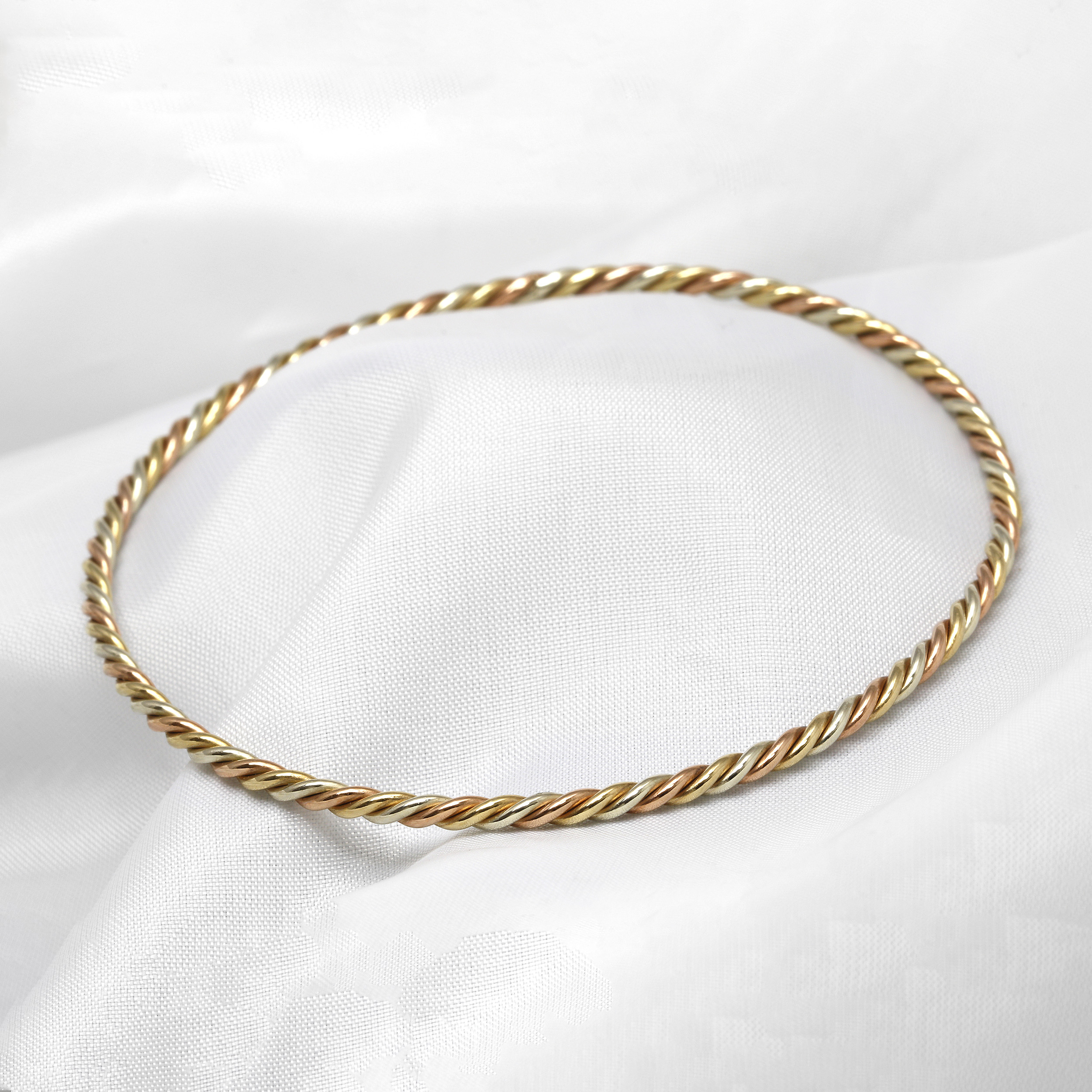 Three Colour Twisted Bangle in 9ct Gold