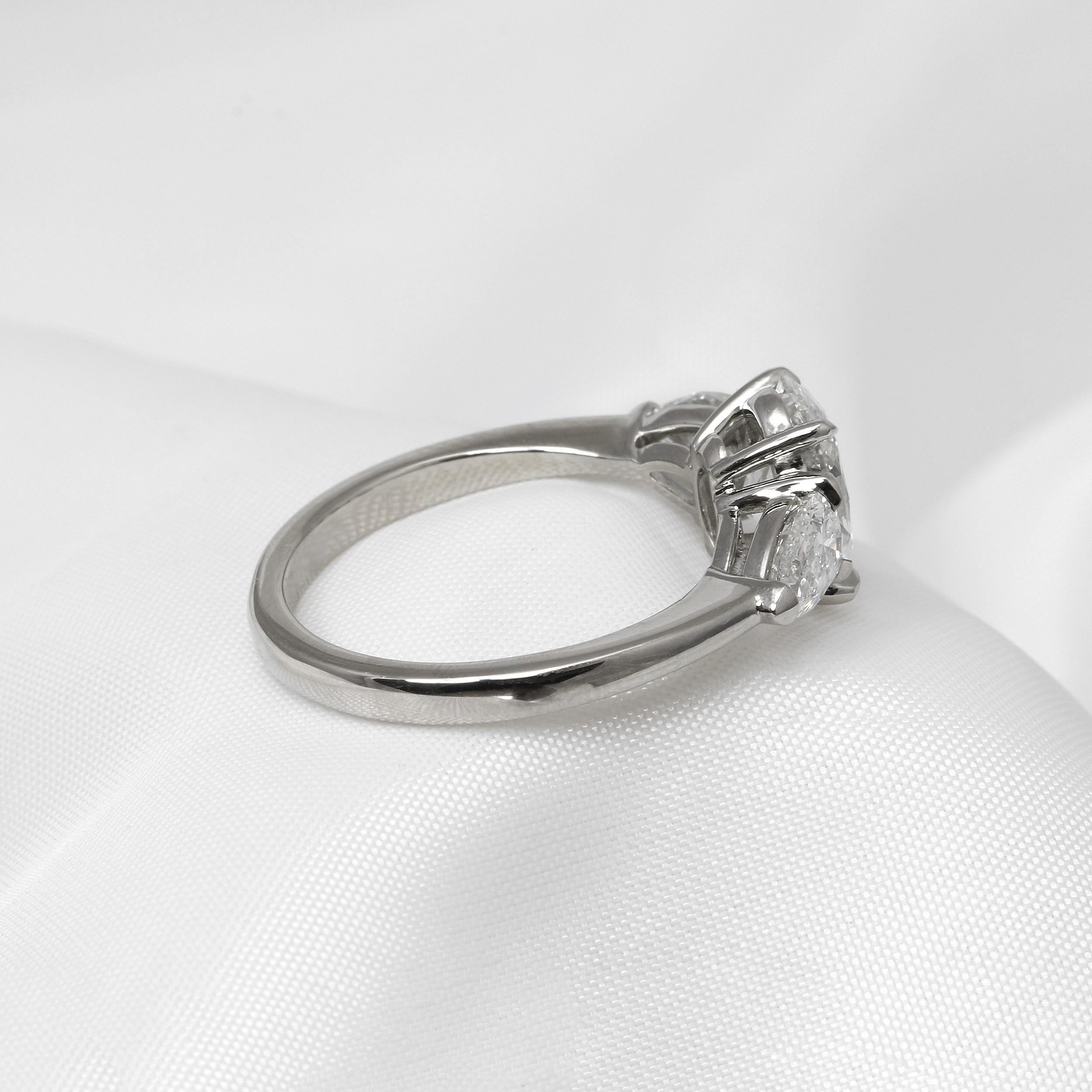 Laboratory Created Oval and Pear Three Stone Diamond Ring