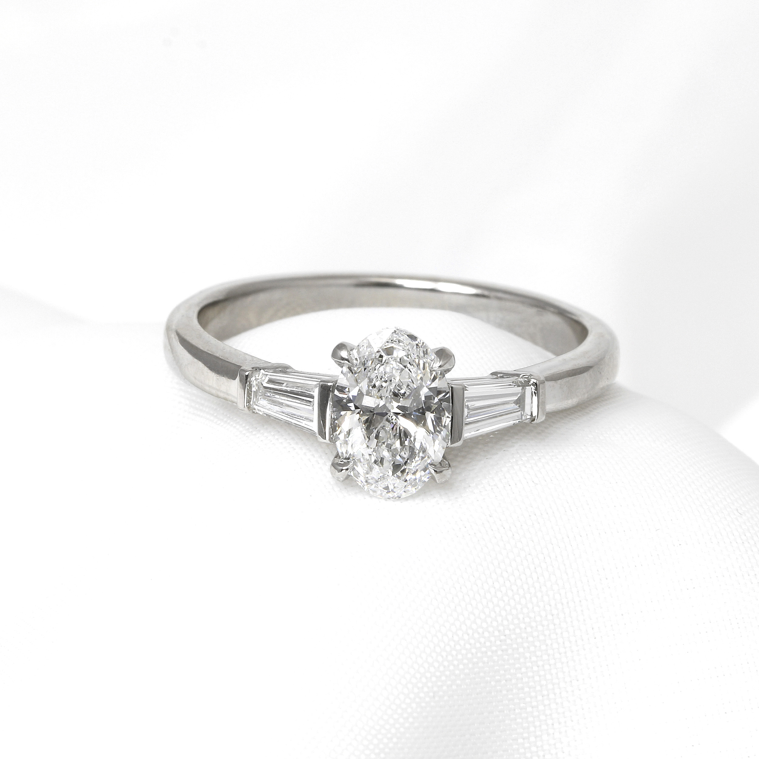 Laboratory Created Oval Diamond and Tapered Baguette Ring