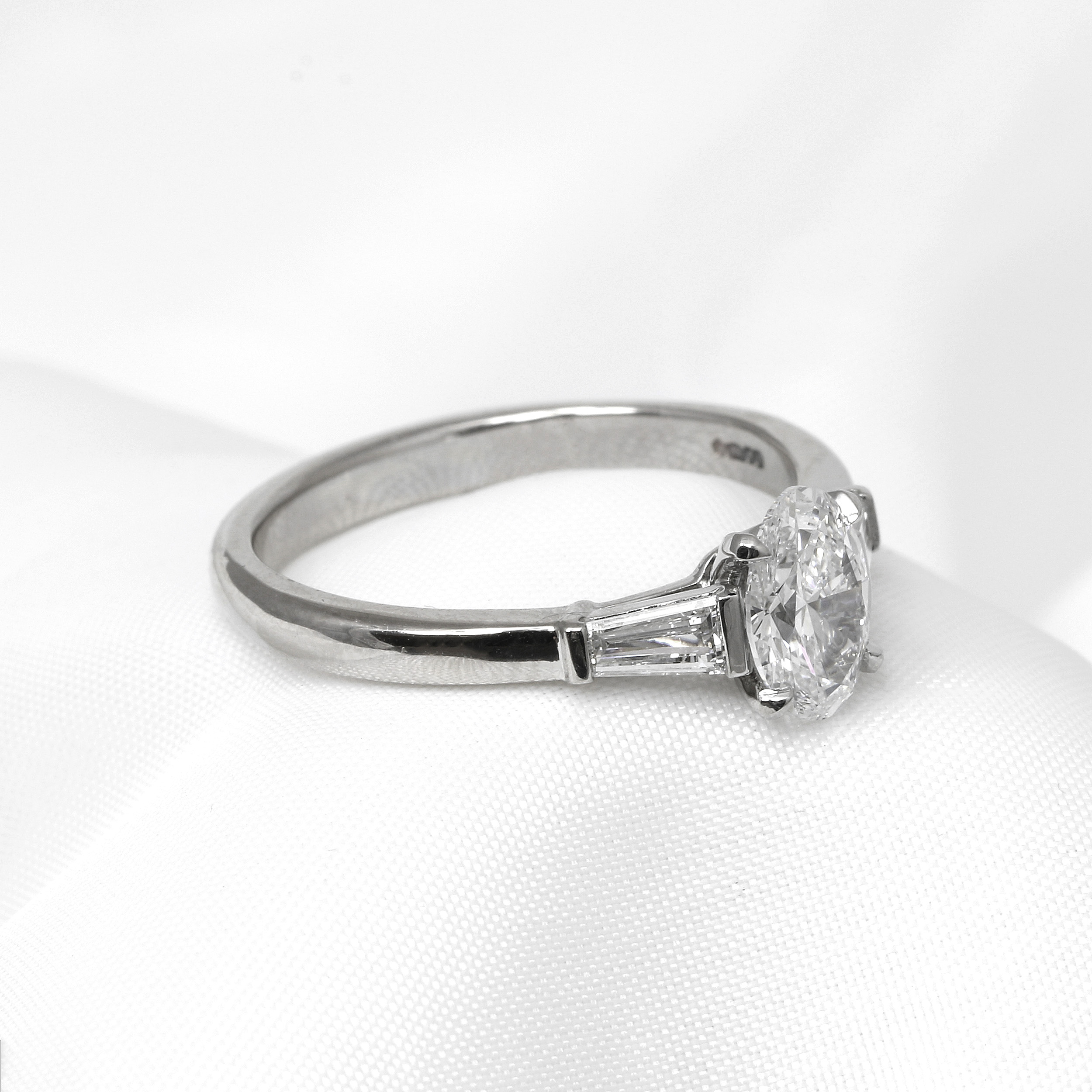 Laboratory Created Oval Diamond and Tapered Baguette Ring