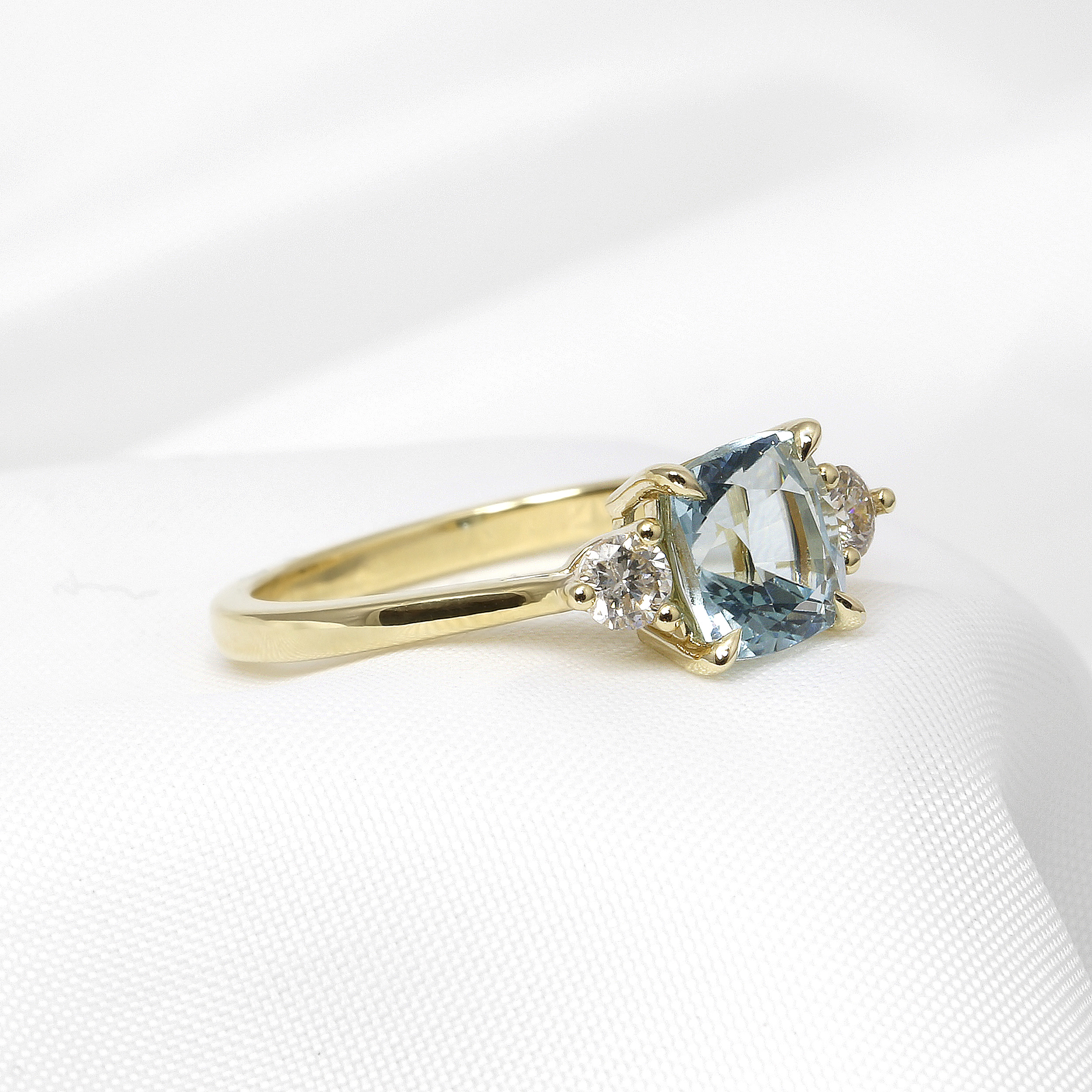 Aquamarine and Diamond Three Stone Ring in 9ct Yellow Gold