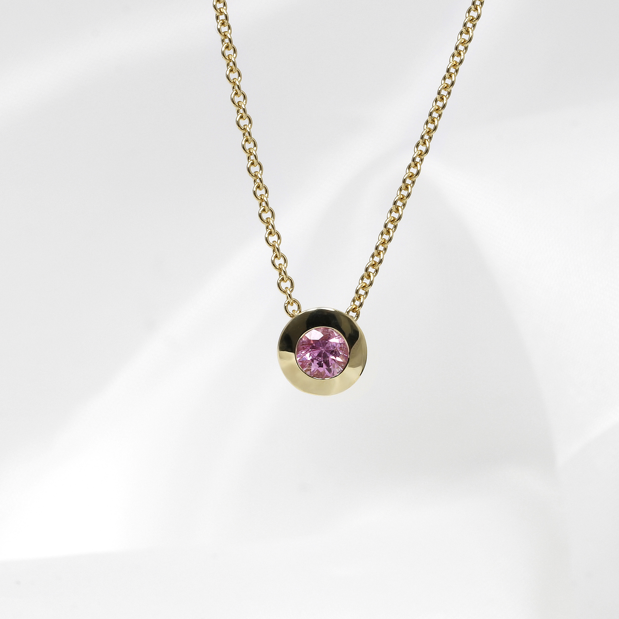 Pink Sapphire Solitaire Pendant in Yellow Gold