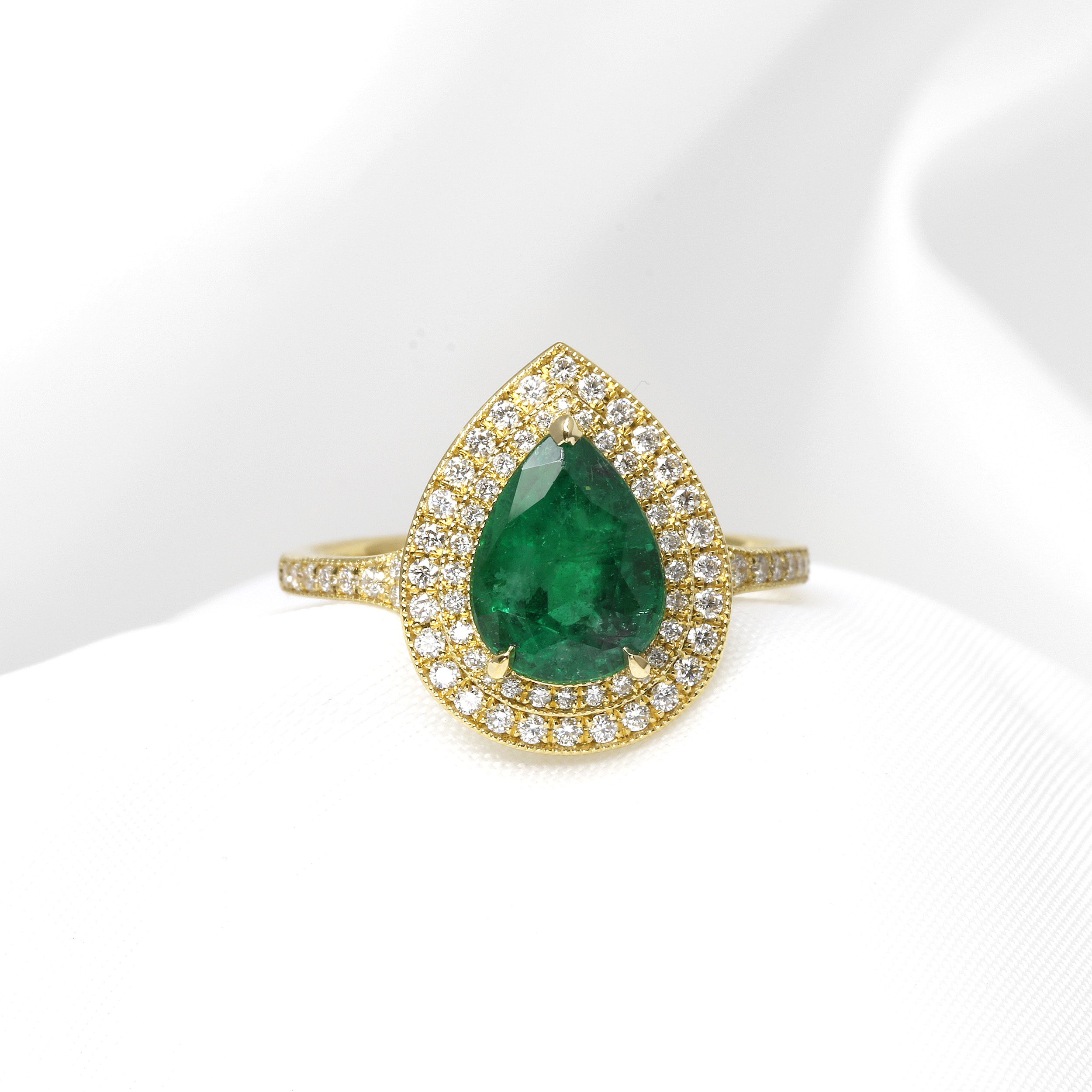 Emerald and Diamond Pear Shape Double Halo Ring in 18ct Yellow Gold