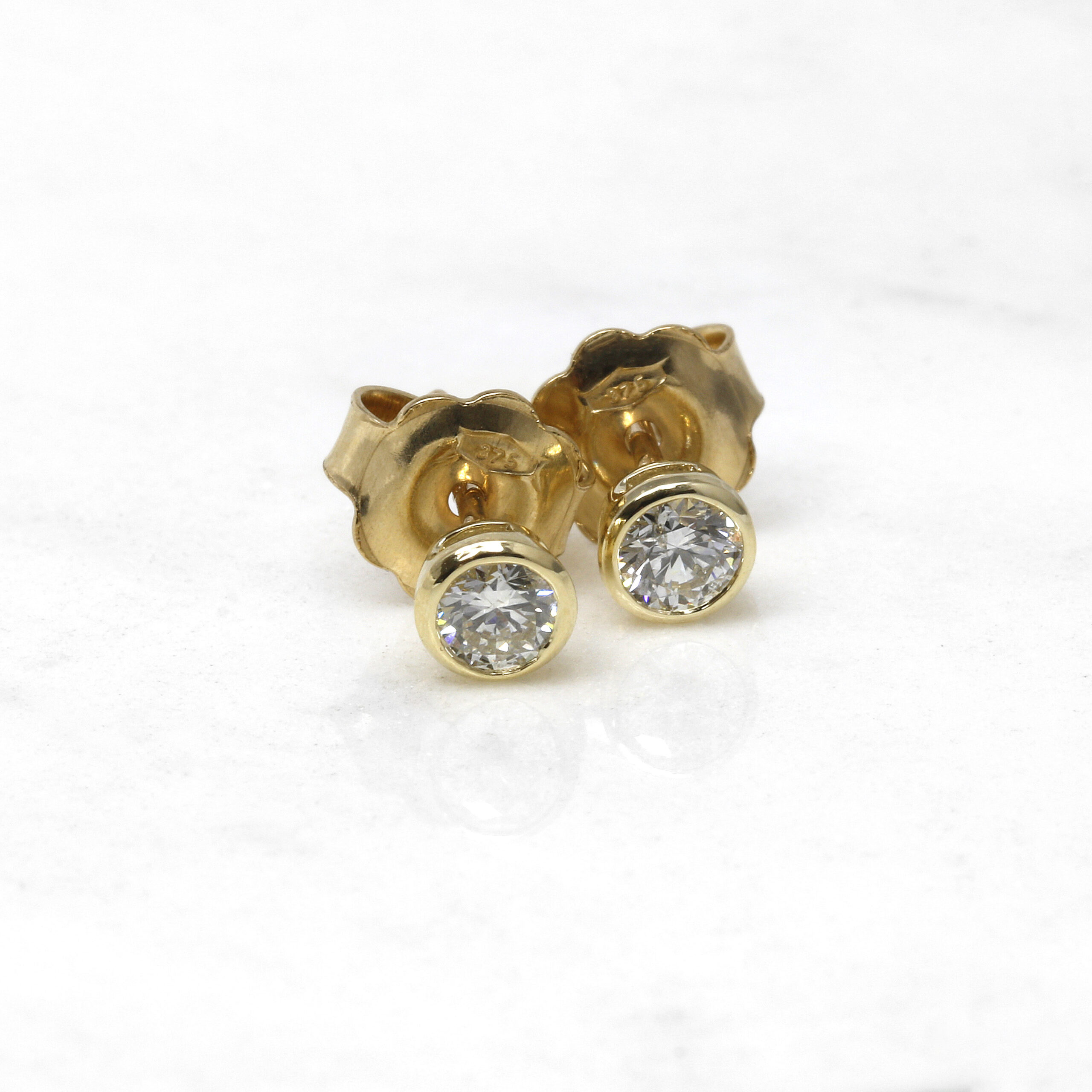 0.40ct Diamond Solitaire Rub Over Set Stud Earrings