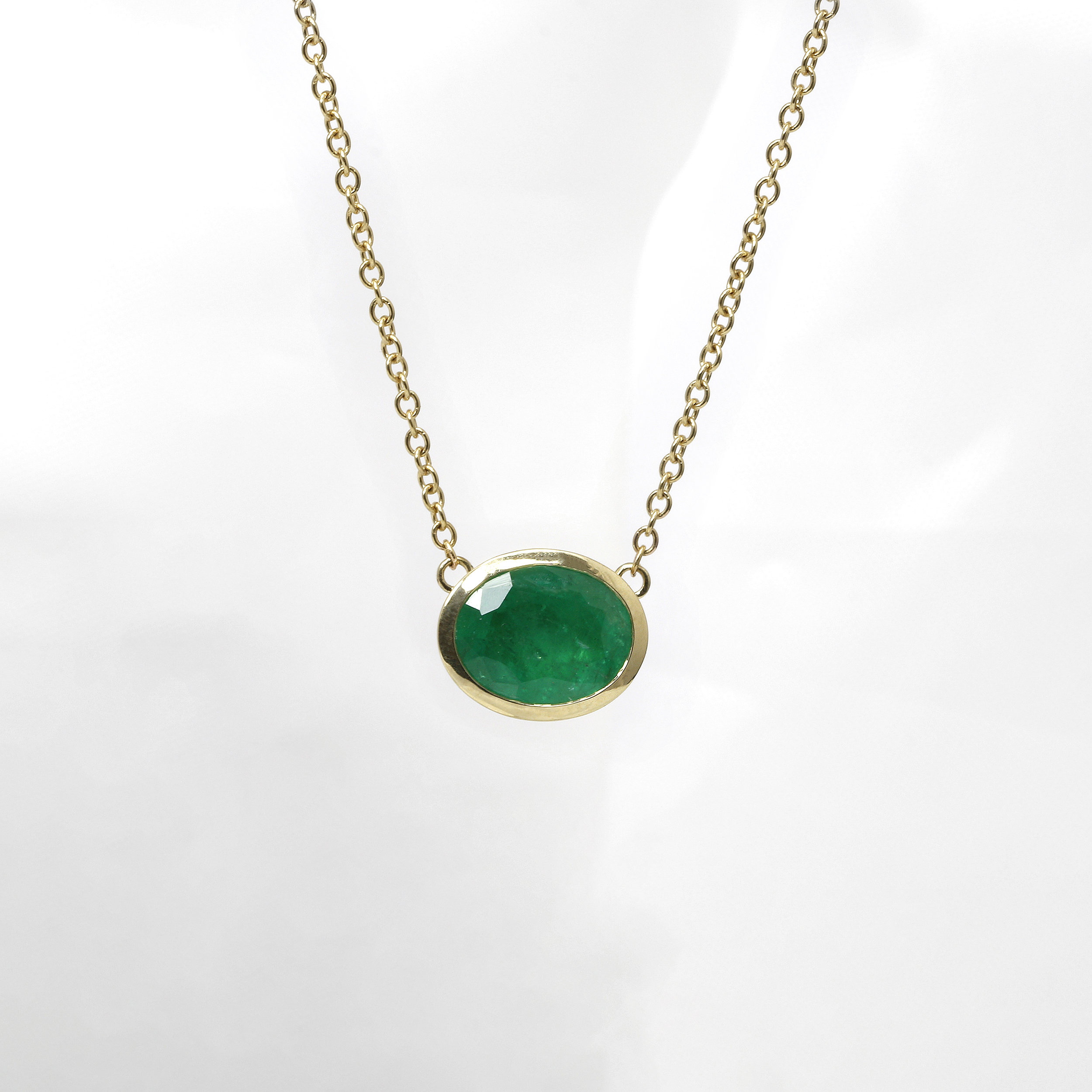 Oval Emerald Necklace in 9ct Yellow Gold