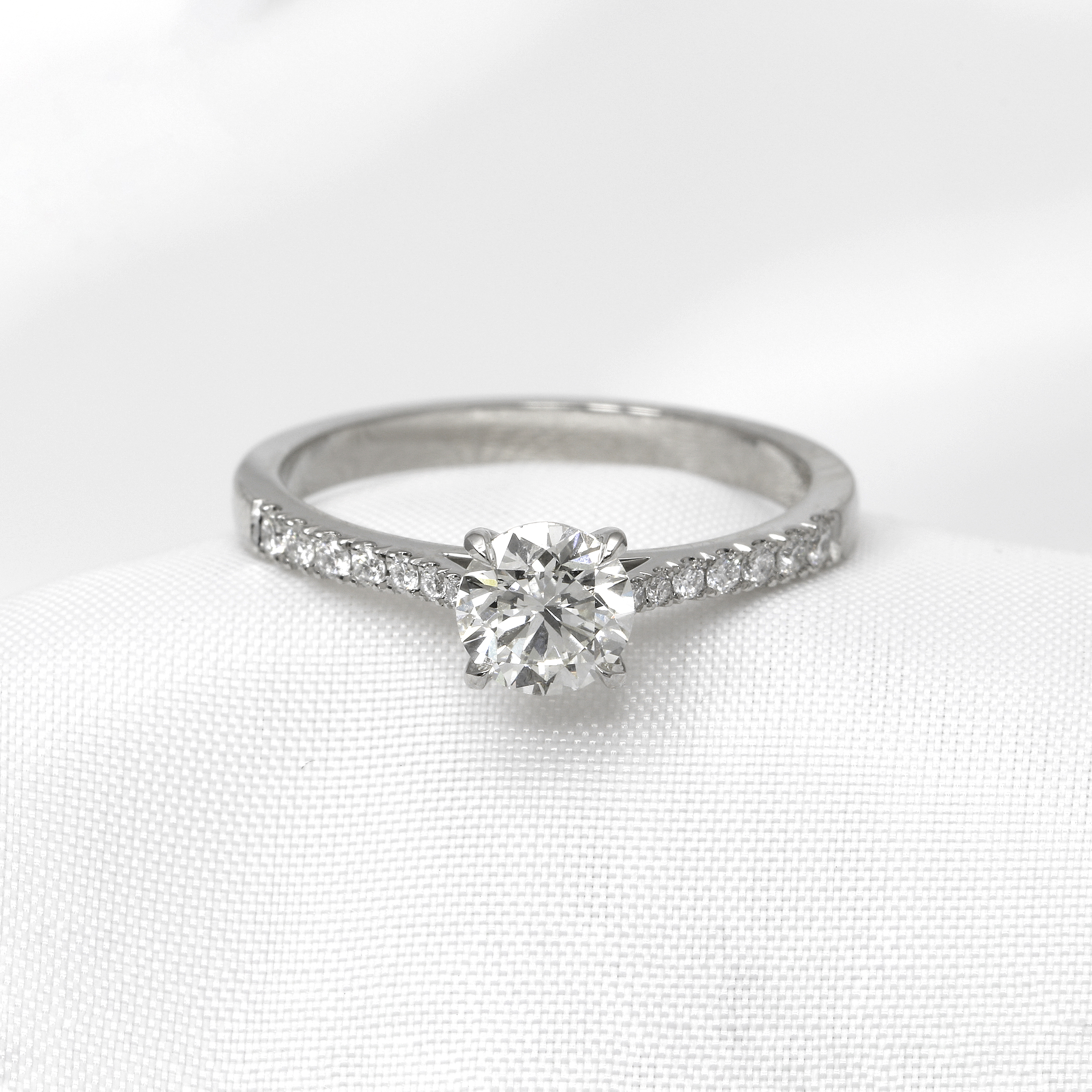 Diamond Solitaire Ring with Stone Set Shoulders in Platinum