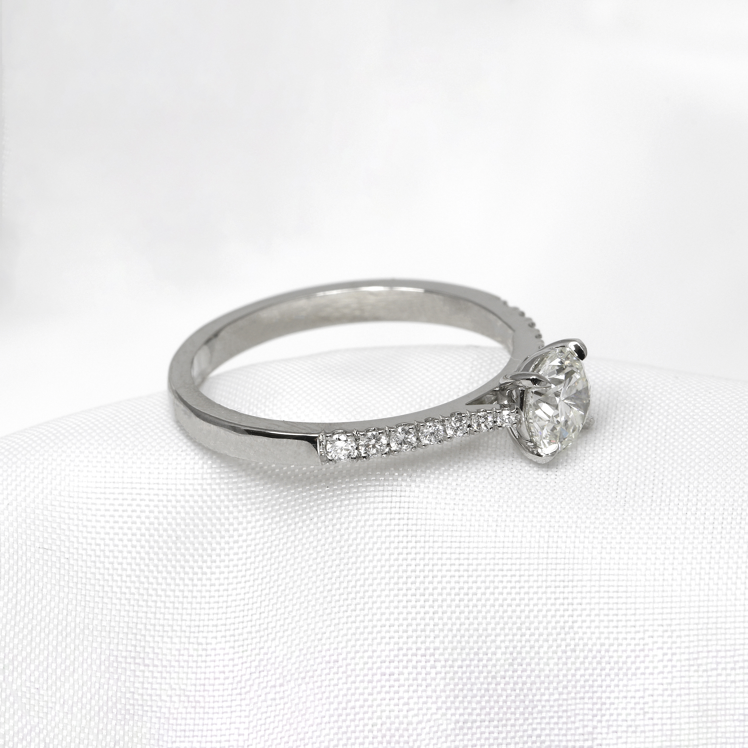 Diamond Solitaire Ring with Stone Set Shoulders in Platinum