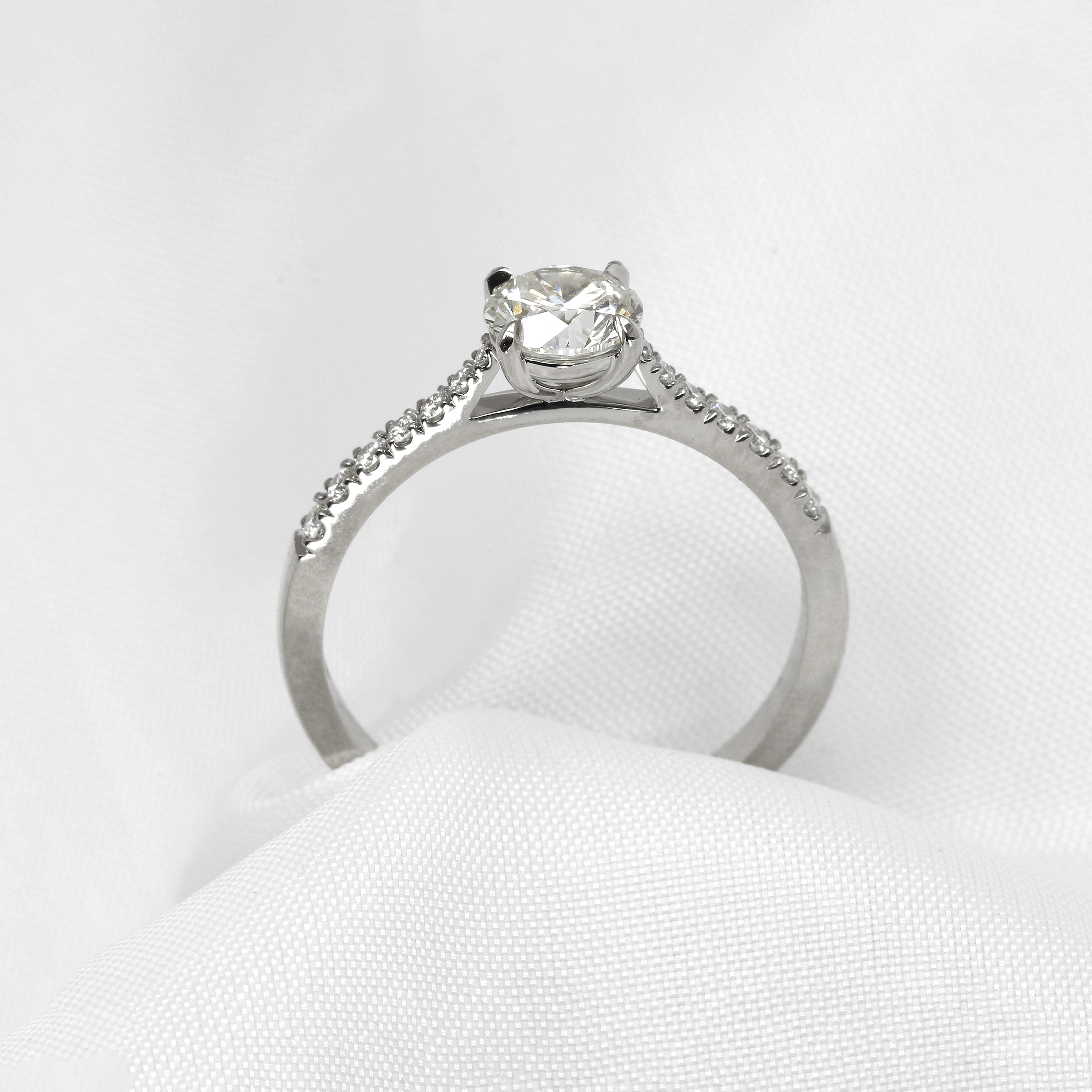Diamond Solitaire Ring with Stone Set Shoulders in Platinum