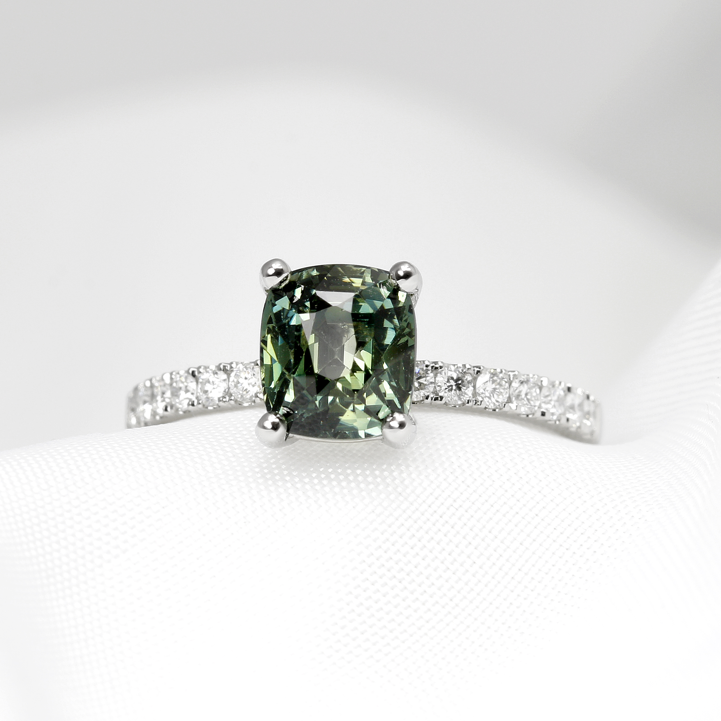 Bespoke Commission Engagement Ring with Green Sapphire and Diamond Shoulders in Platinum 2024