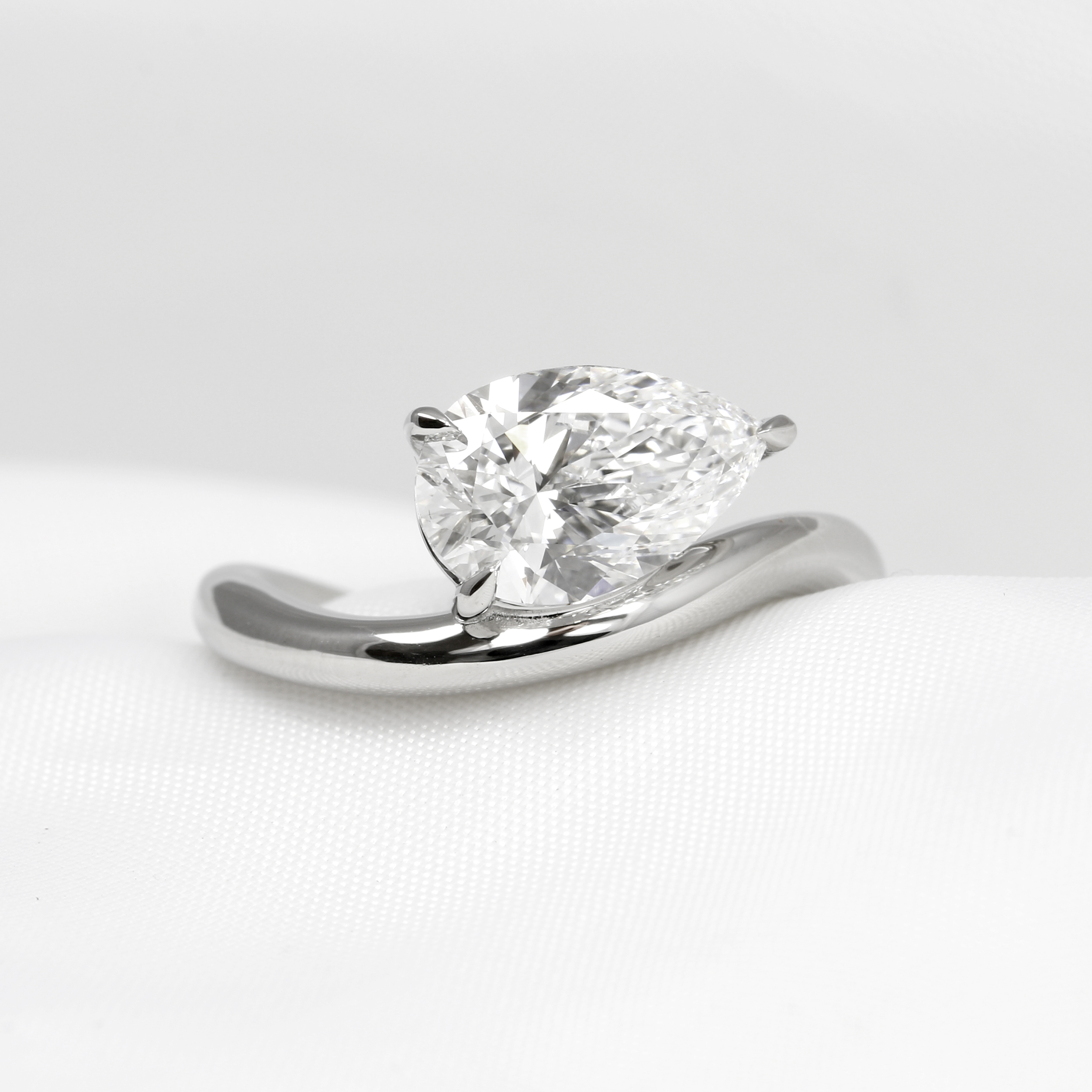 Bespoke Commission Engagement Ring with Optical Illusion Floating Pear Diamond in Platinum