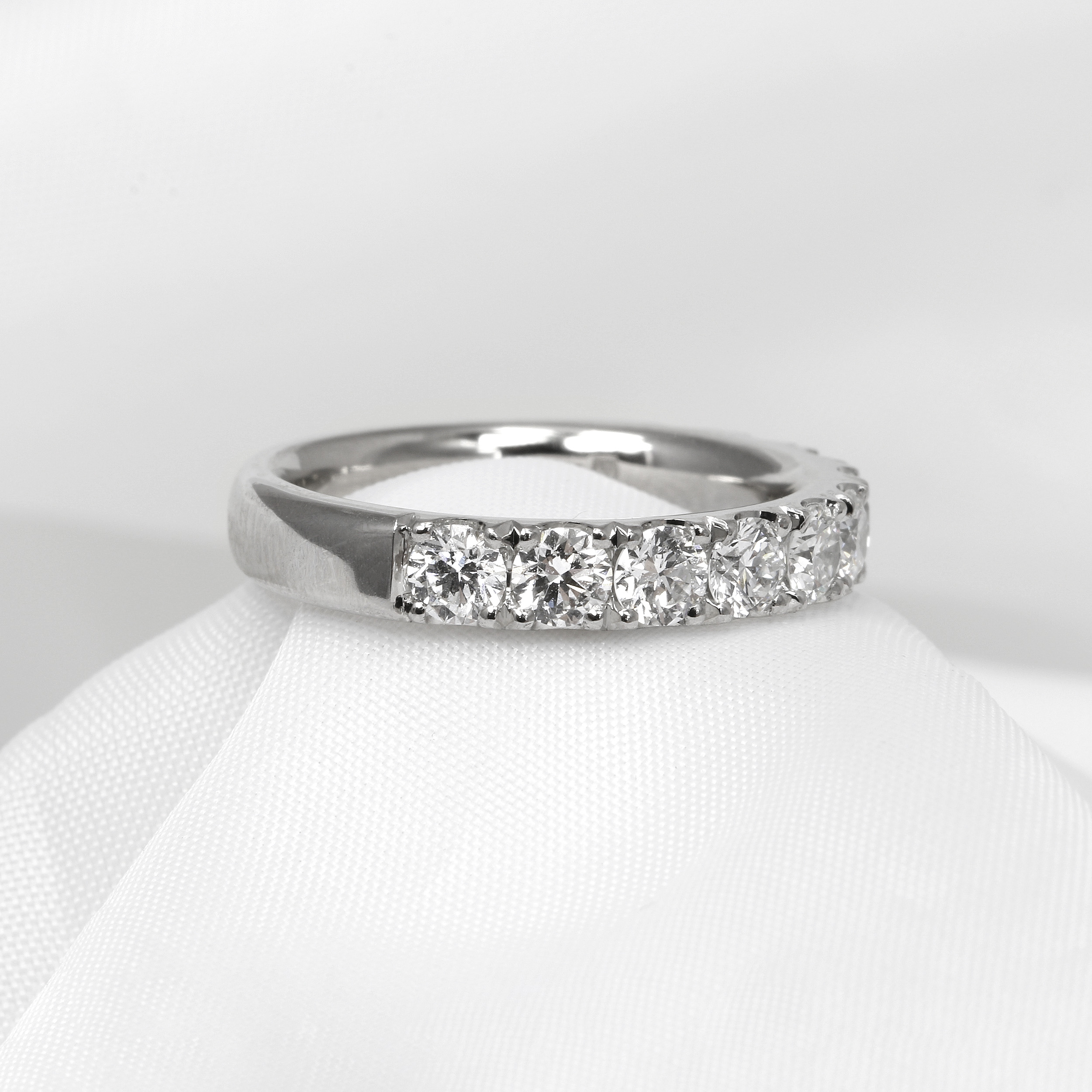 Cutaway Claw Set Diamond Eternity Ring in Platinum