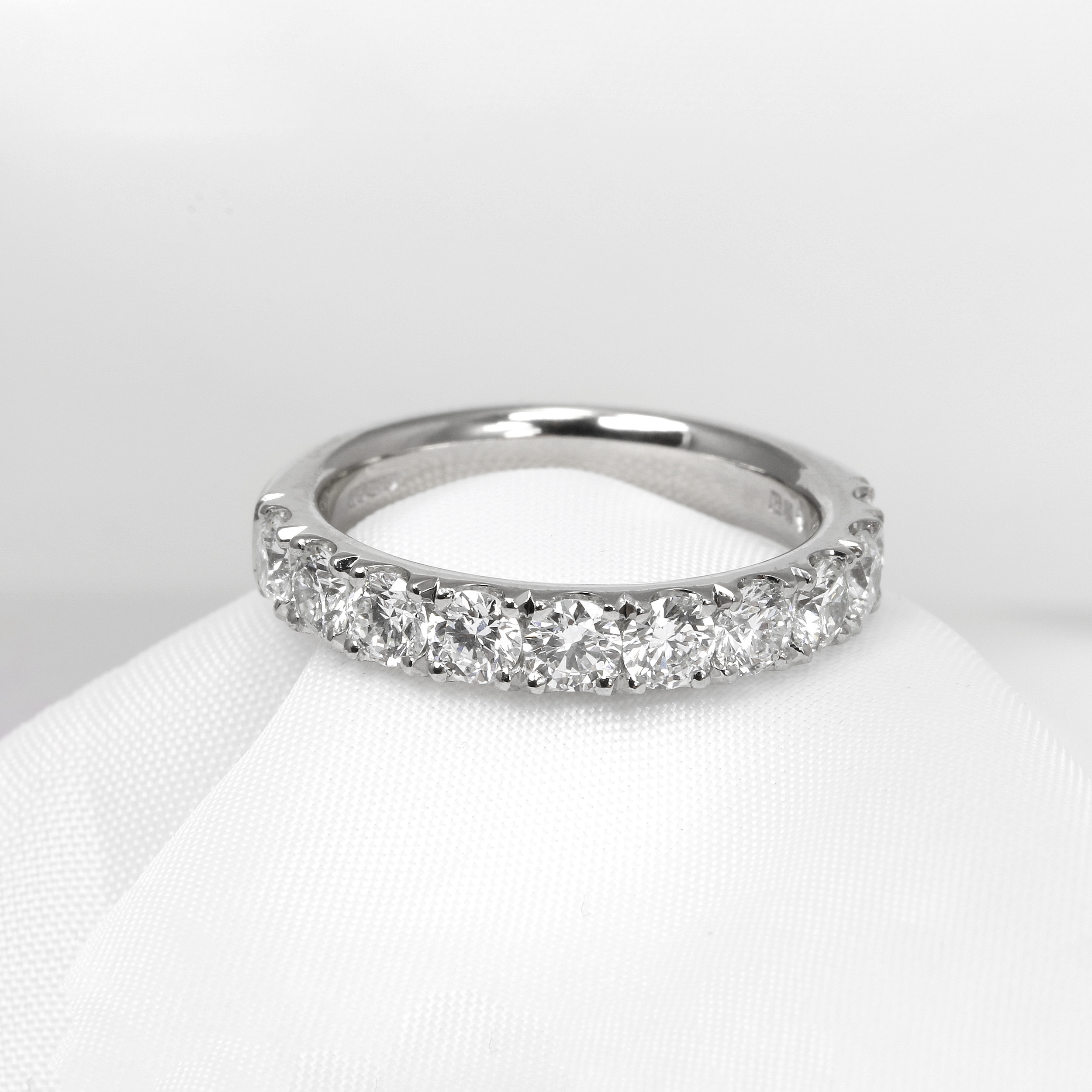 Cutaway Claw Set Diamond Eternity Ring in Platinum